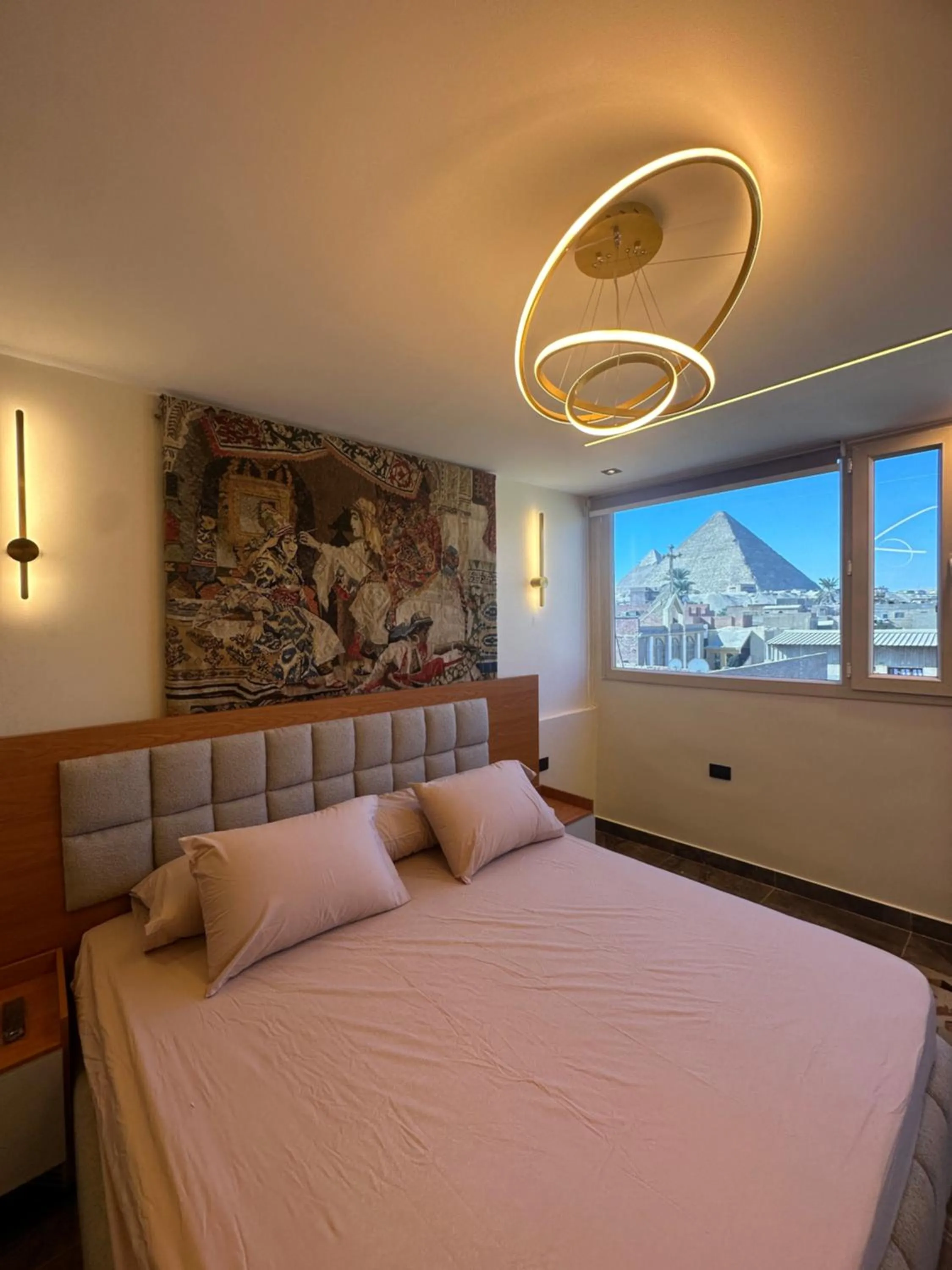 Bed in Osiris pyramids view inn