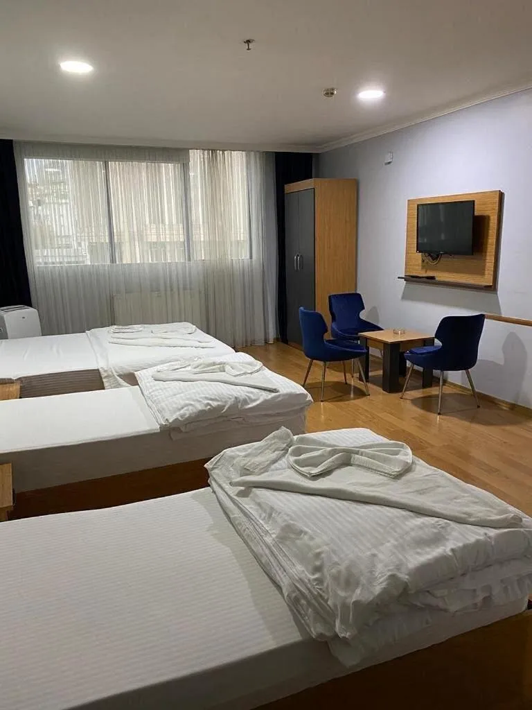 Bed in Heraldic Room Hotel