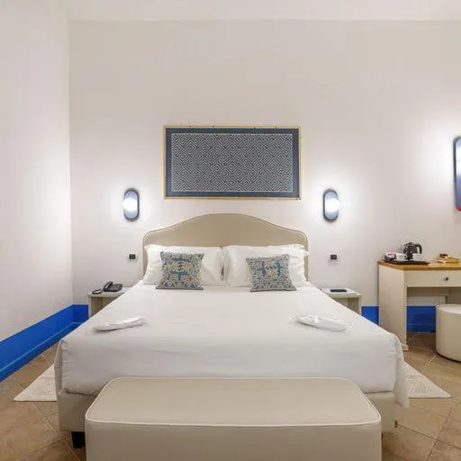 Bed in Riva di Palo Beach Hotel