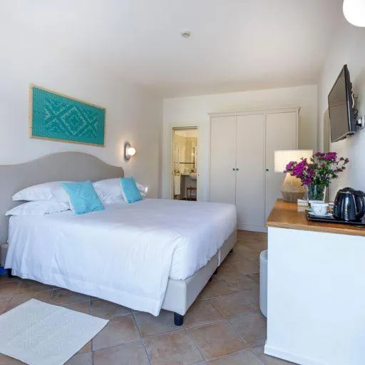 Bed in Riva di Palo Beach Hotel