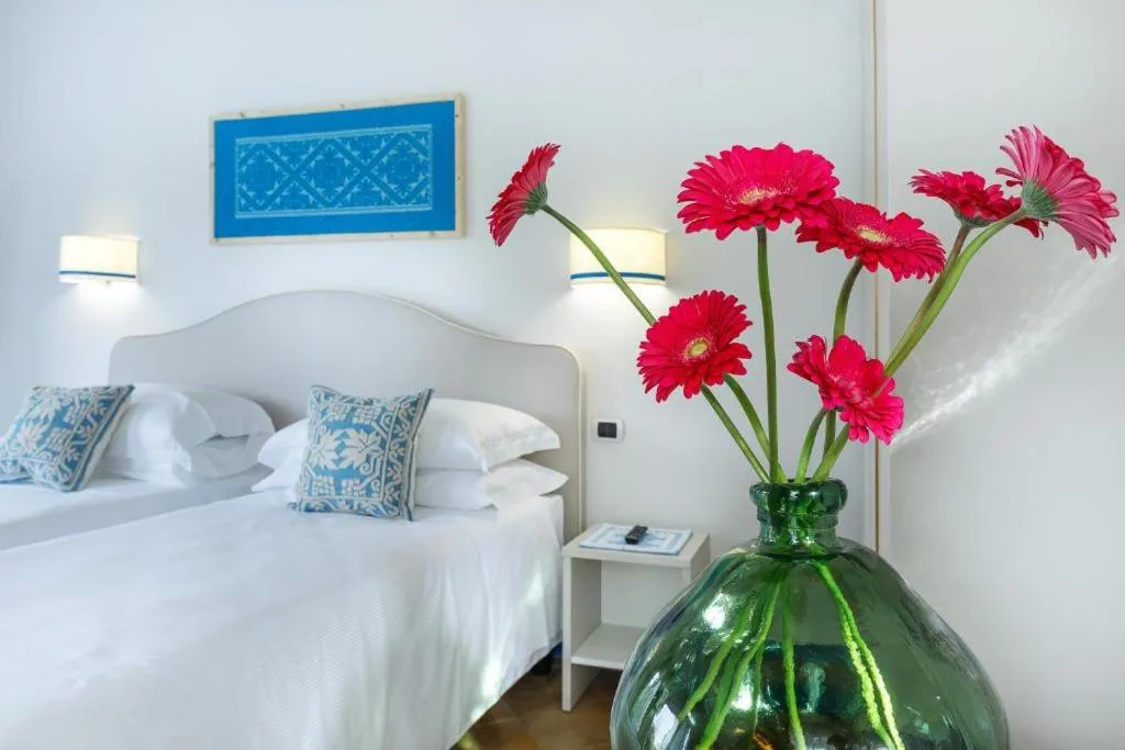 Bed in Riva di Palo Beach Hotel