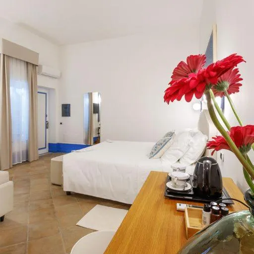 Photo of the whole room, Bed in Riva di Palo Beach Hotel