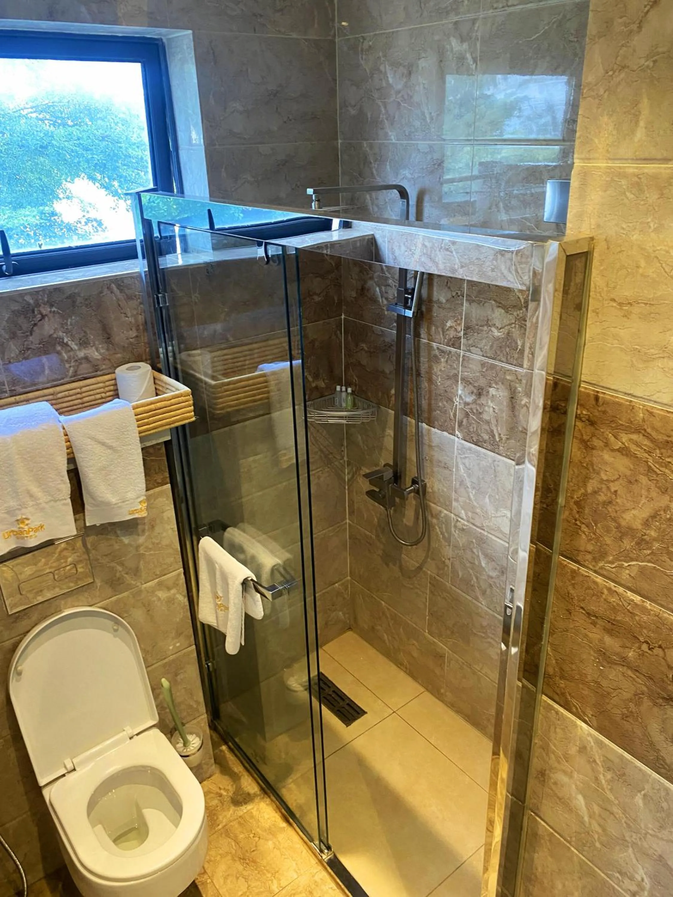 Shower in Urban Park Suites Hotel