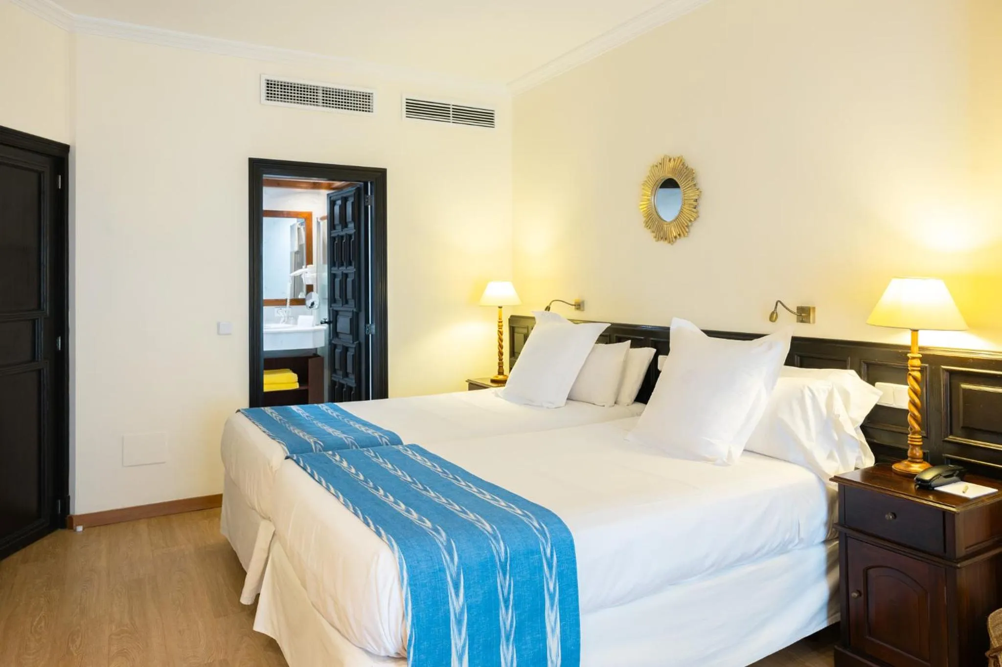 Bed in Hotel Bon Sol Resort & Spa