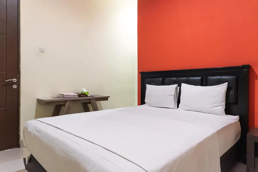 Bed in TwoSpaces Living at Toedjoeh Enam Homestay, Surabaya