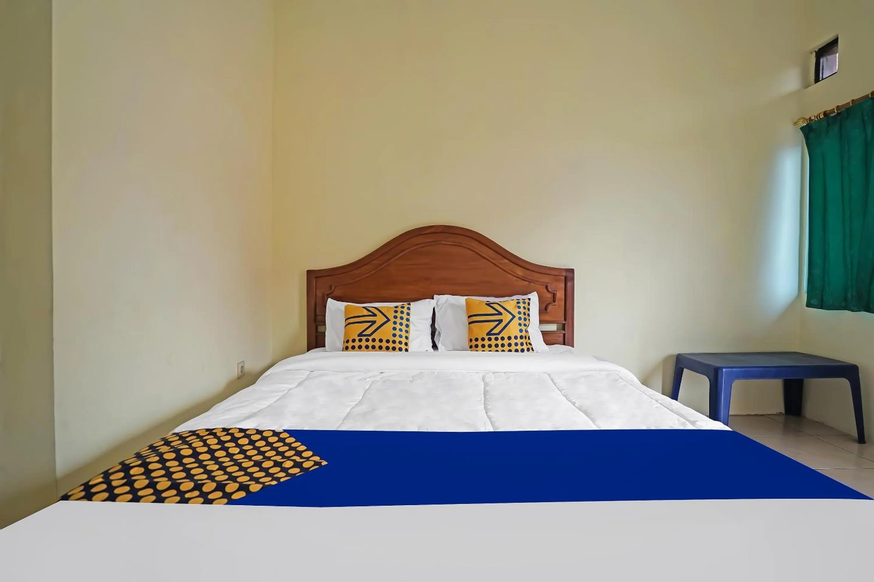 Bedroom in Hotel O Arfan HouseNearDanau Ranau