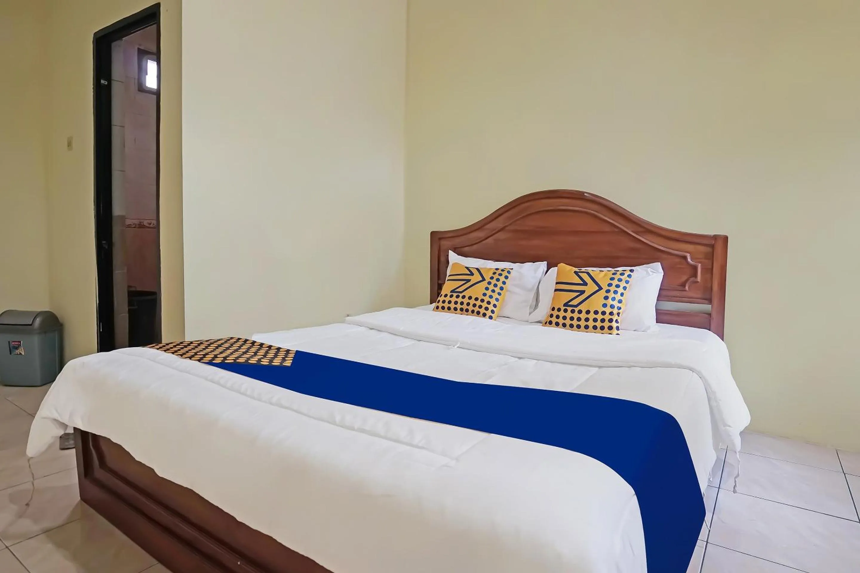 Bedroom in Hotel O Arfan HouseNearDanau Ranau