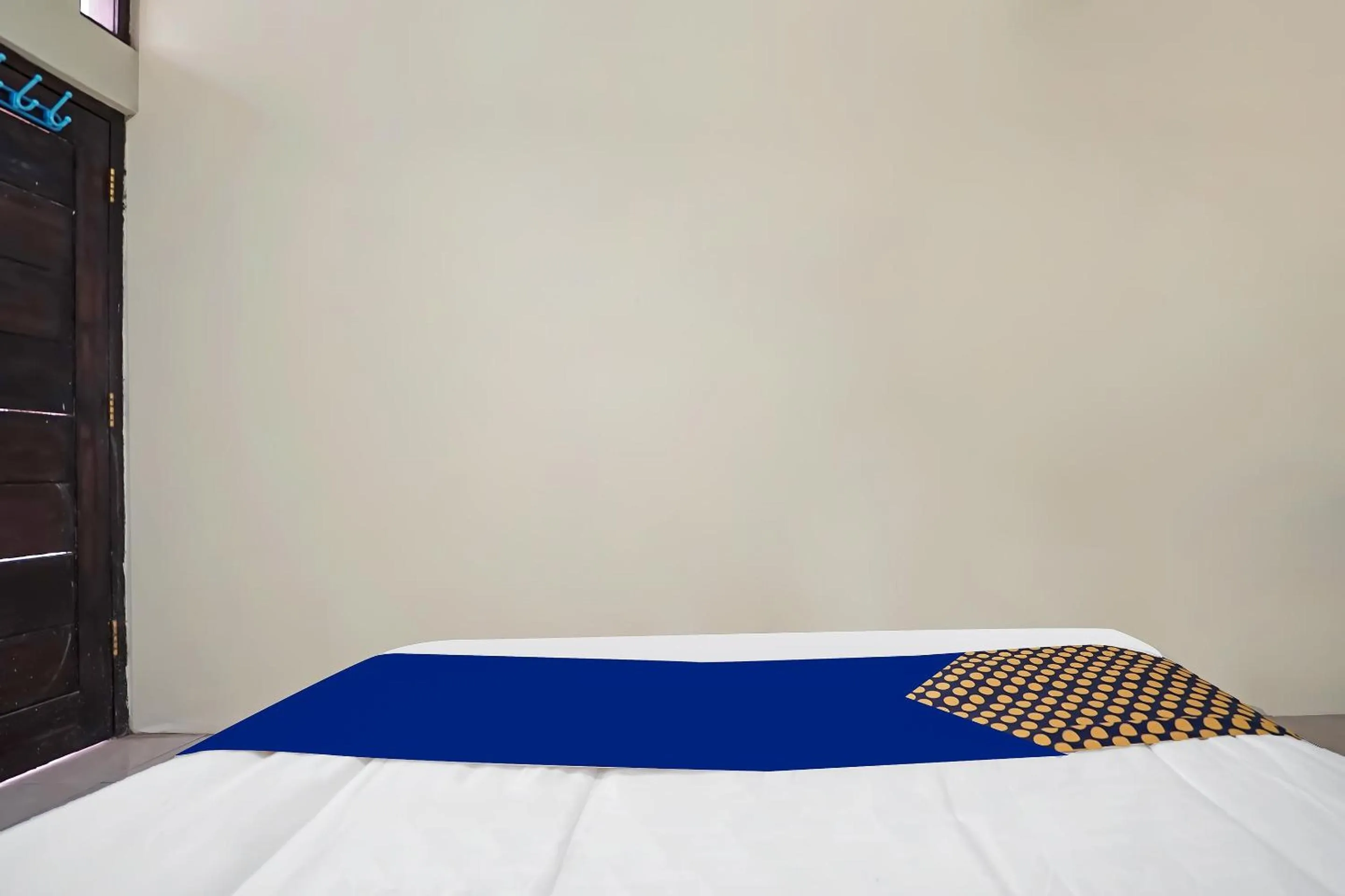 Bedroom in Hotel O Arfan HouseNearDanau Ranau