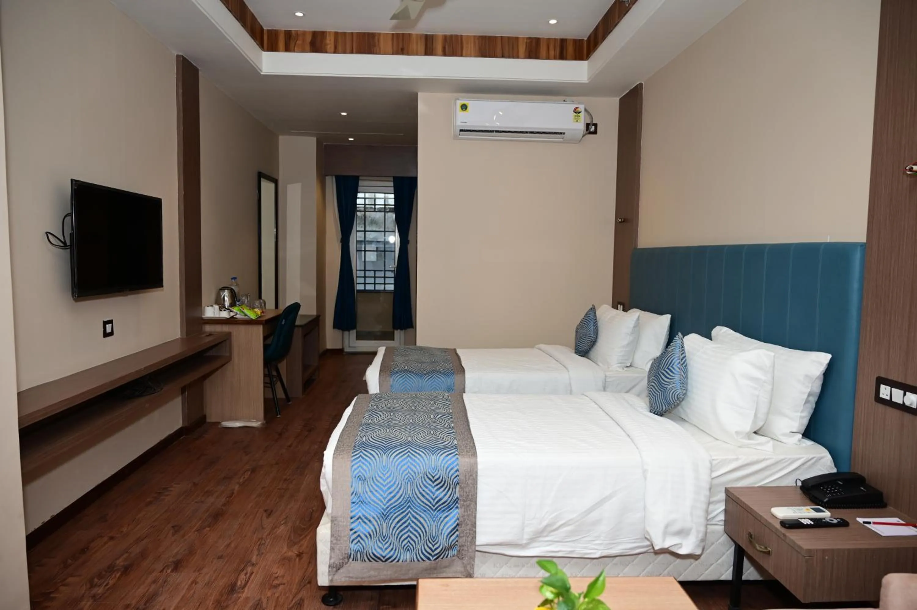 Photo of the whole room, Bed in PIPUL PADMAJA PRIDE