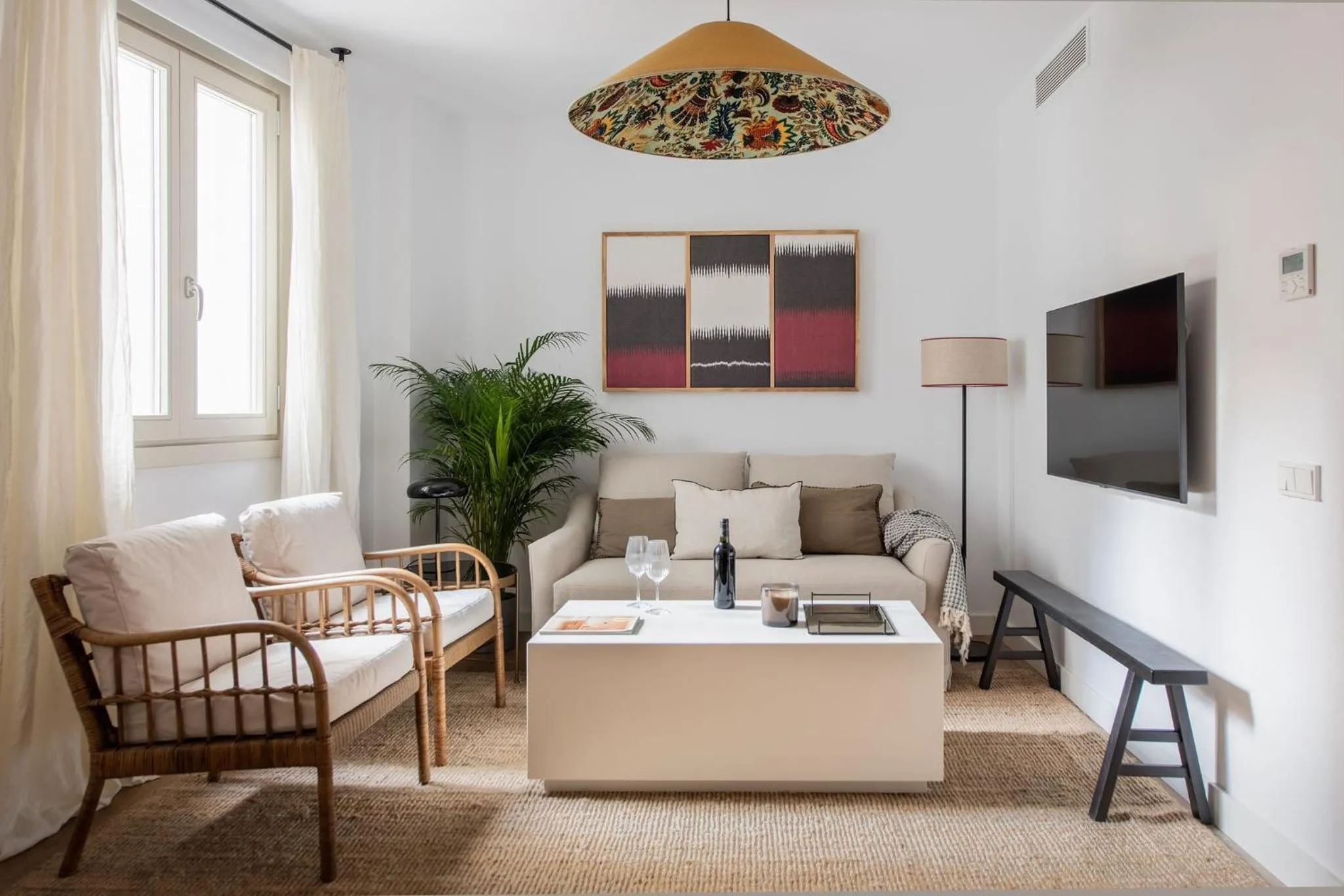 Communal lounge/ TV room in Tetuán 15 Boutique Apartments by Hommyhome