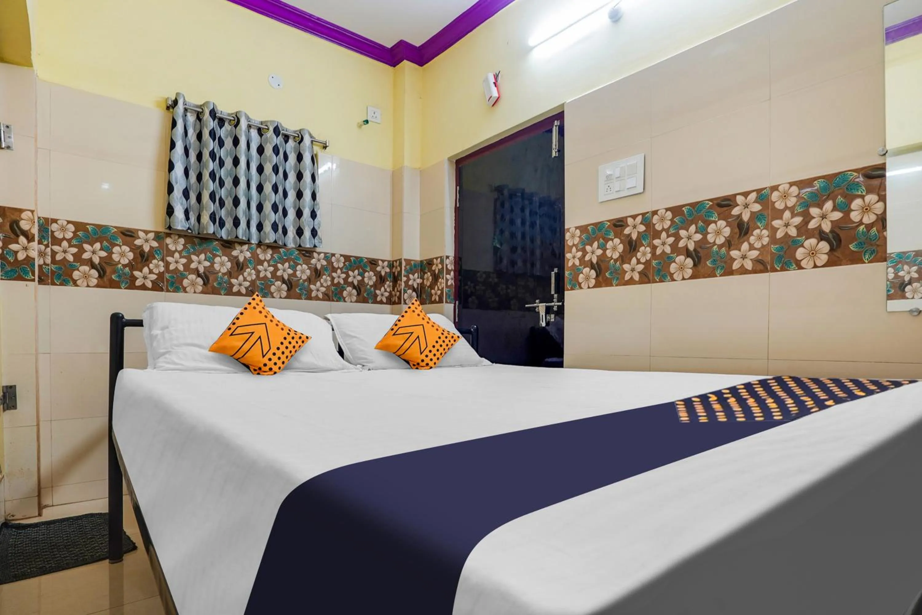 Bedroom in SPOT ON New ROYAL LODGE