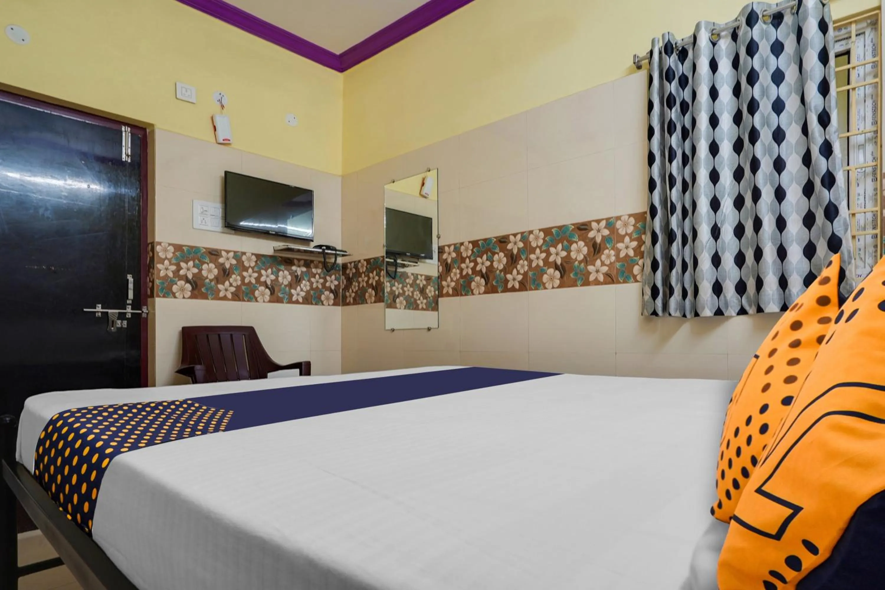 Bedroom in SPOT ON New ROYAL LODGE