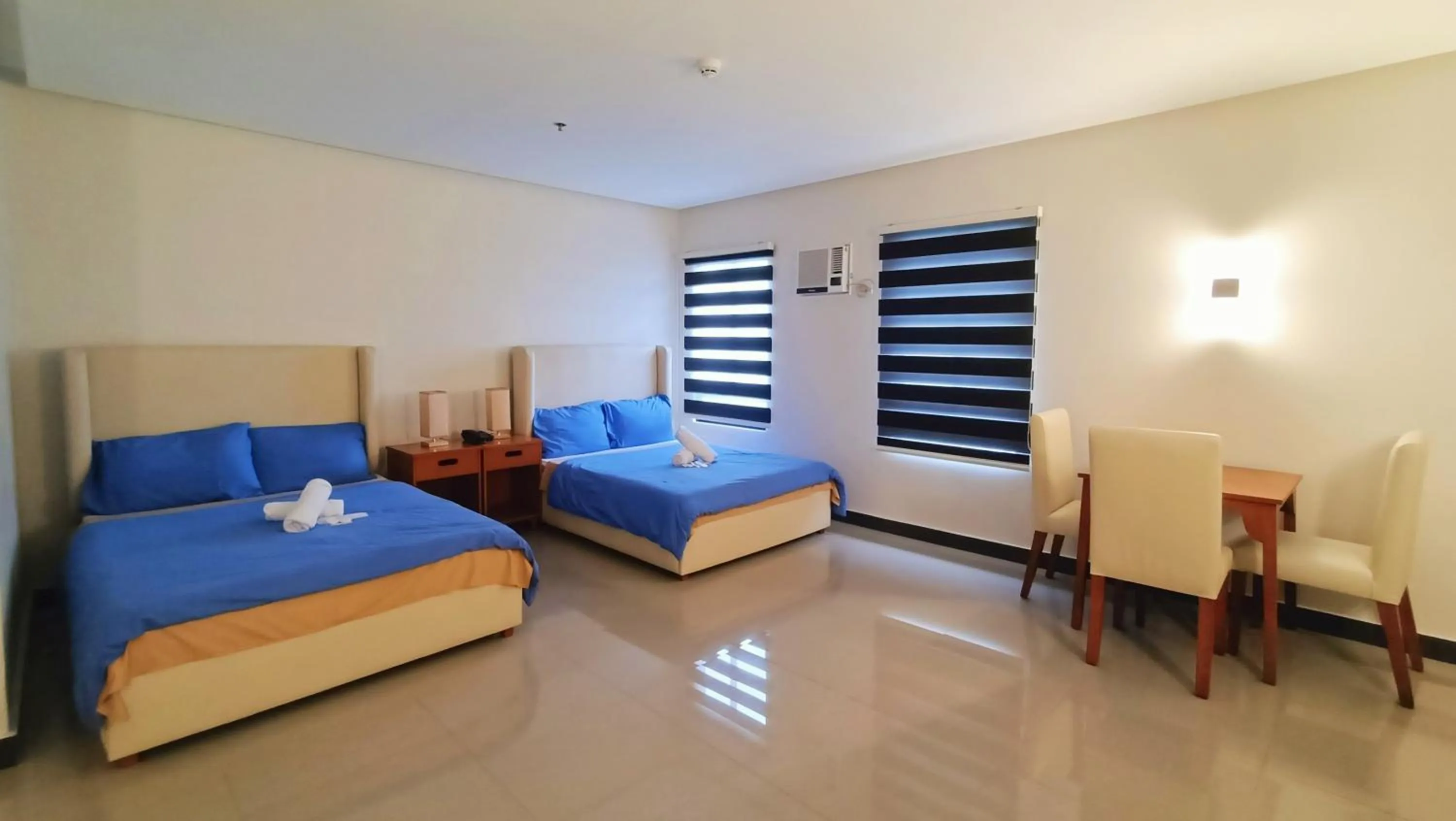 Bed in Grand Emilia Hotel