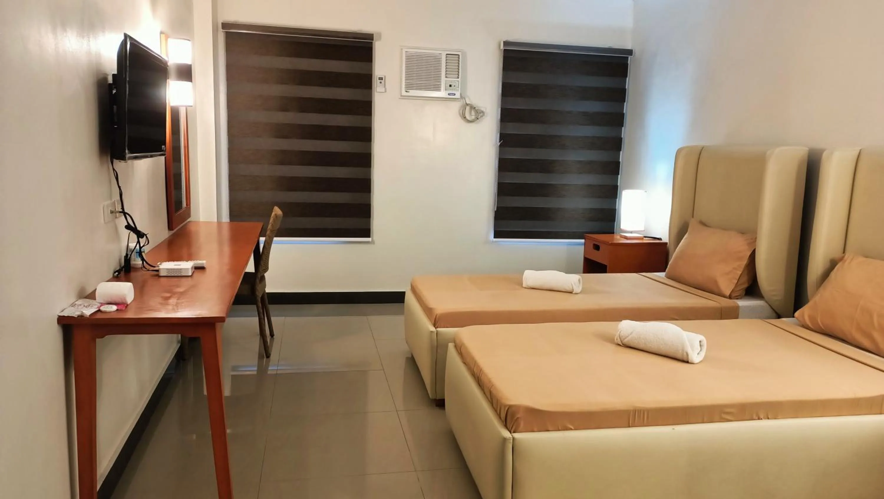 Bed in Grand Emilia Hotel