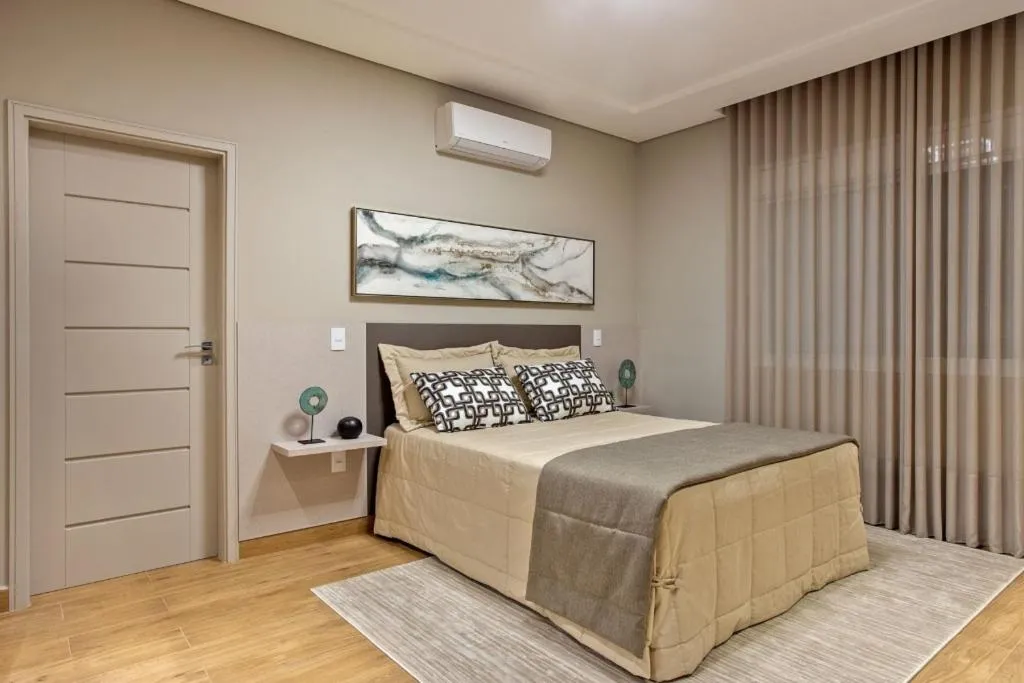 Bed in Casa Mantiqueira Hotel Boutique