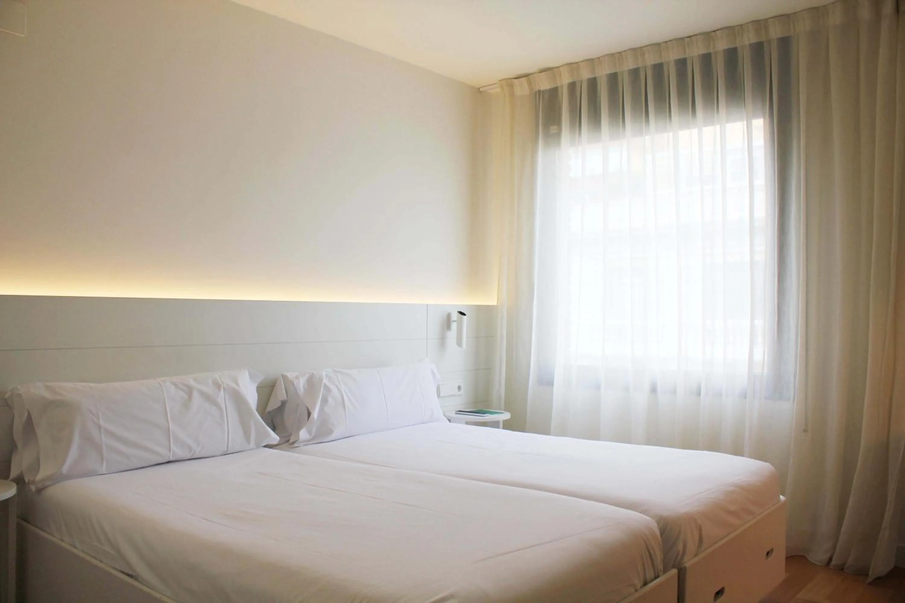 Bed in Pol & Grace Hotel