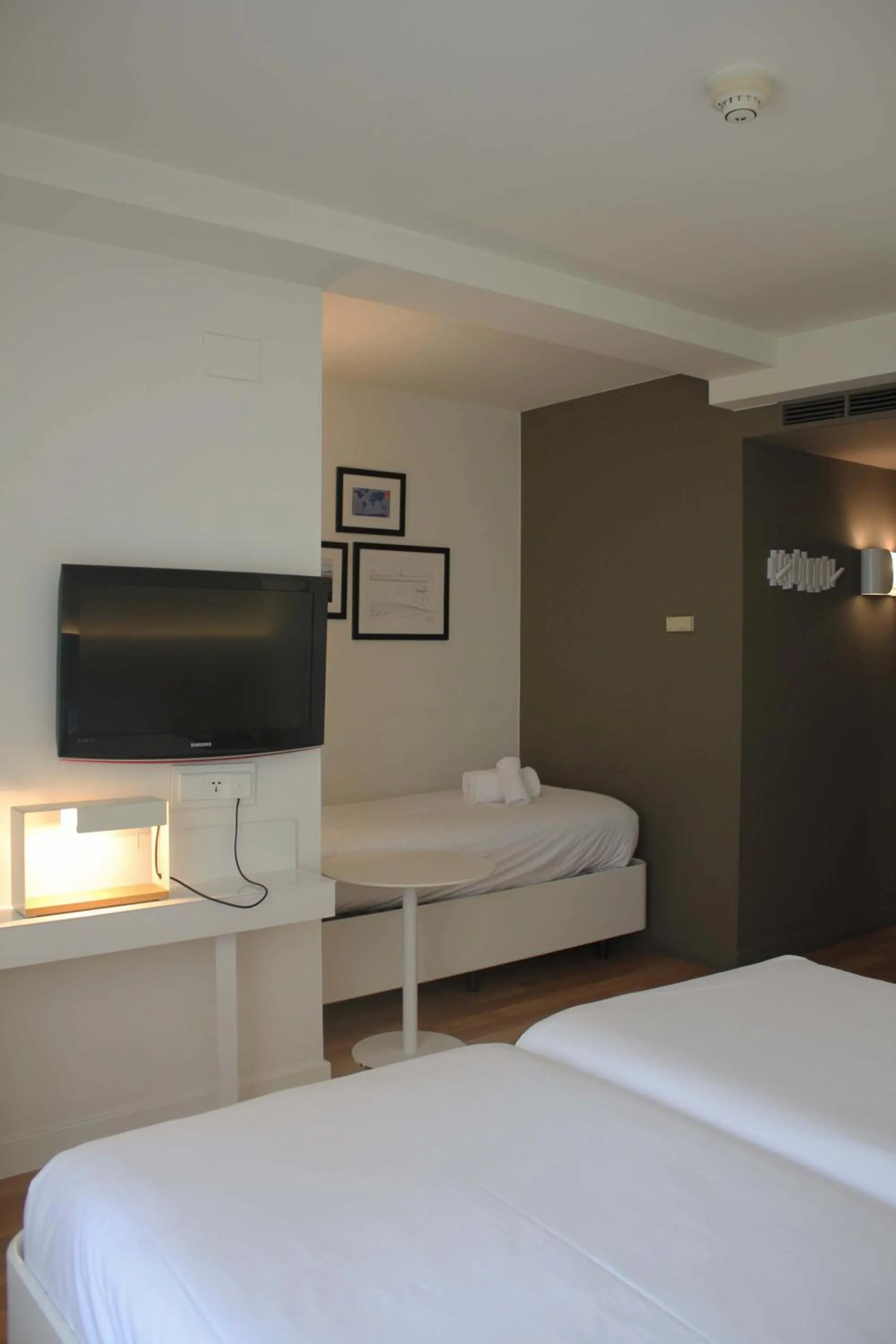 Bed in Pol & Grace Hotel