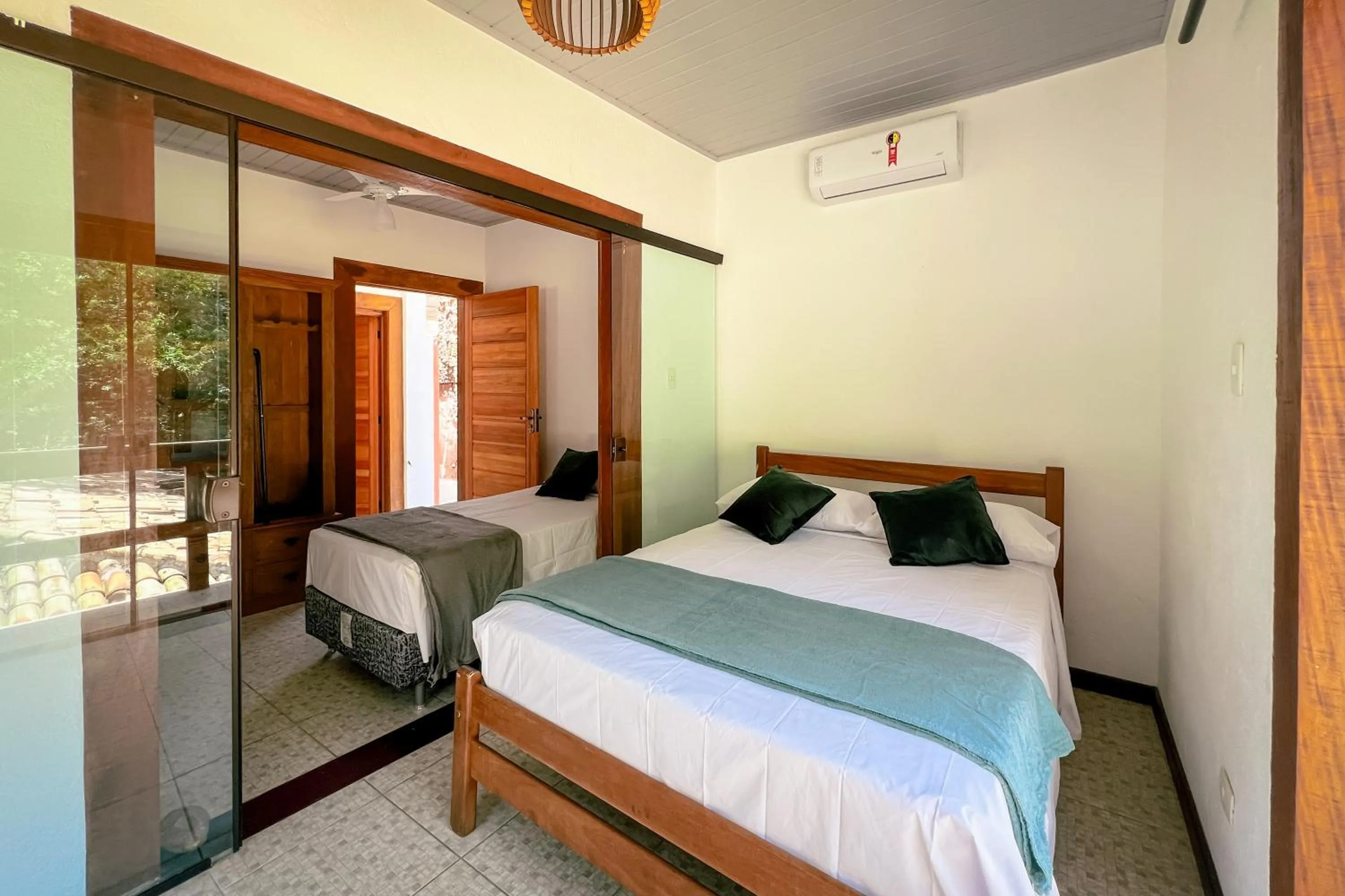 Bed in VELINN Pousada Canoa Ilhabela