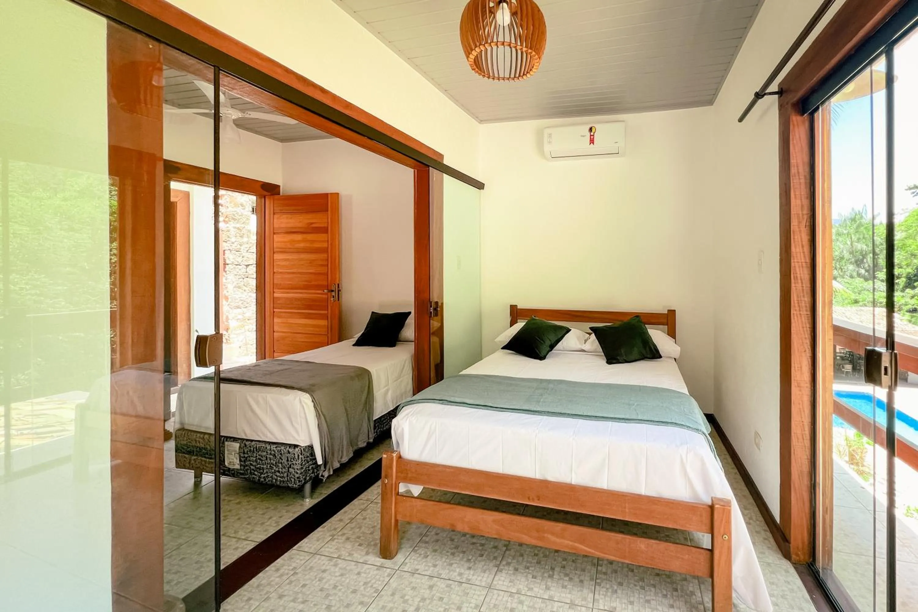 Bed in VELINN Pousada Canoa Ilhabela