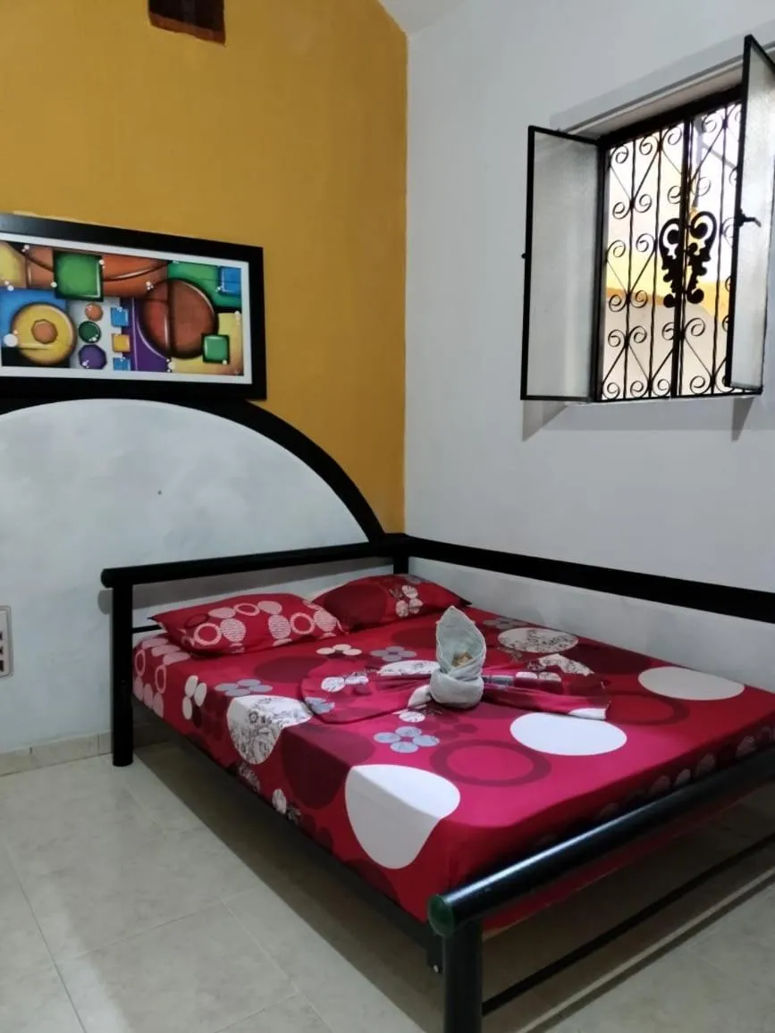 Bed in Hotel Plaza Confort Inn