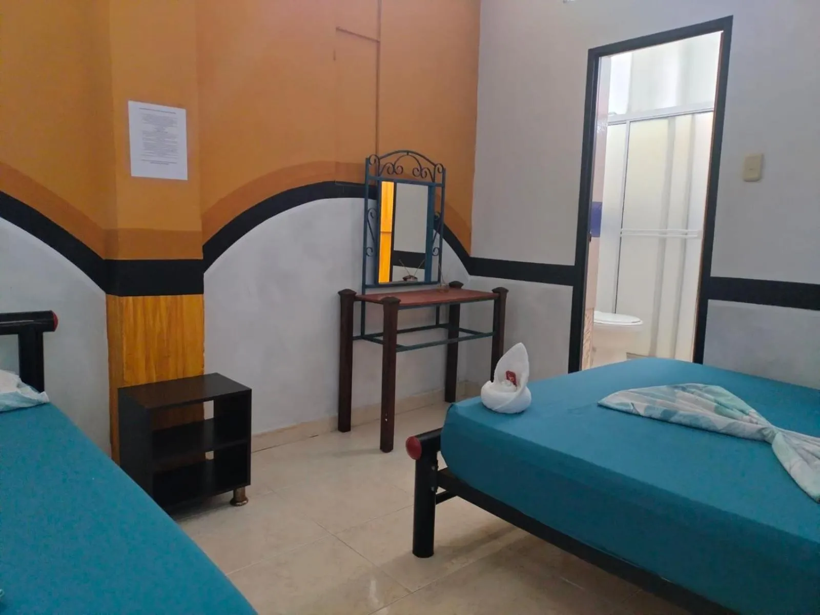 Bed in Hotel Plaza Confort Inn