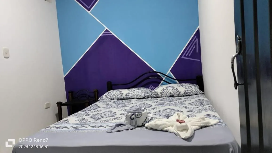 Bed in Hotel Plaza Confort Inn