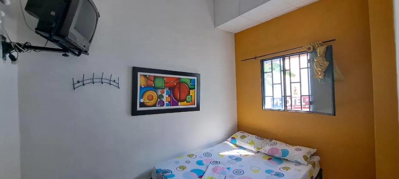 Bed in Hotel Plaza Confort Inn