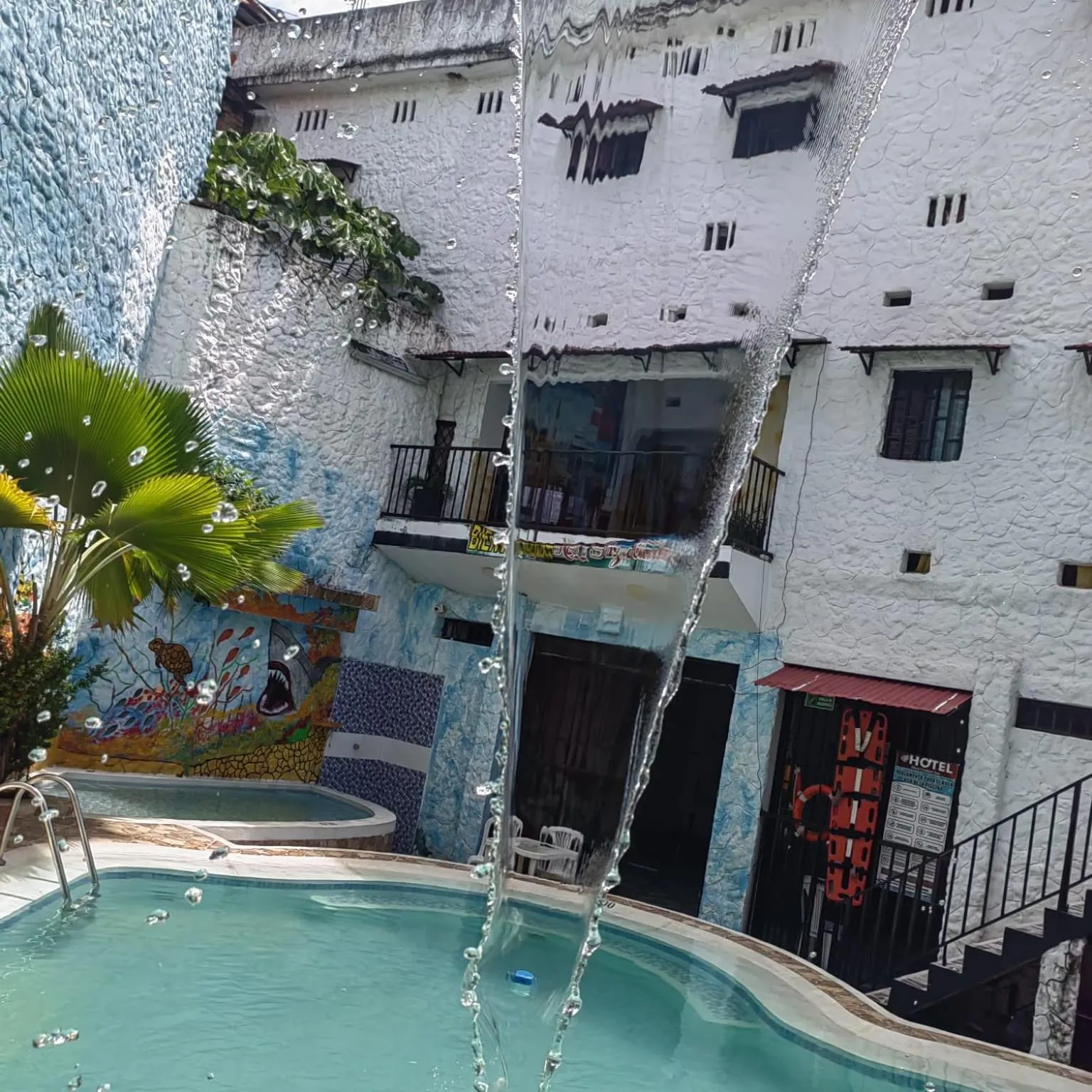 Swimming pool in Hotel Plaza Confort Inn