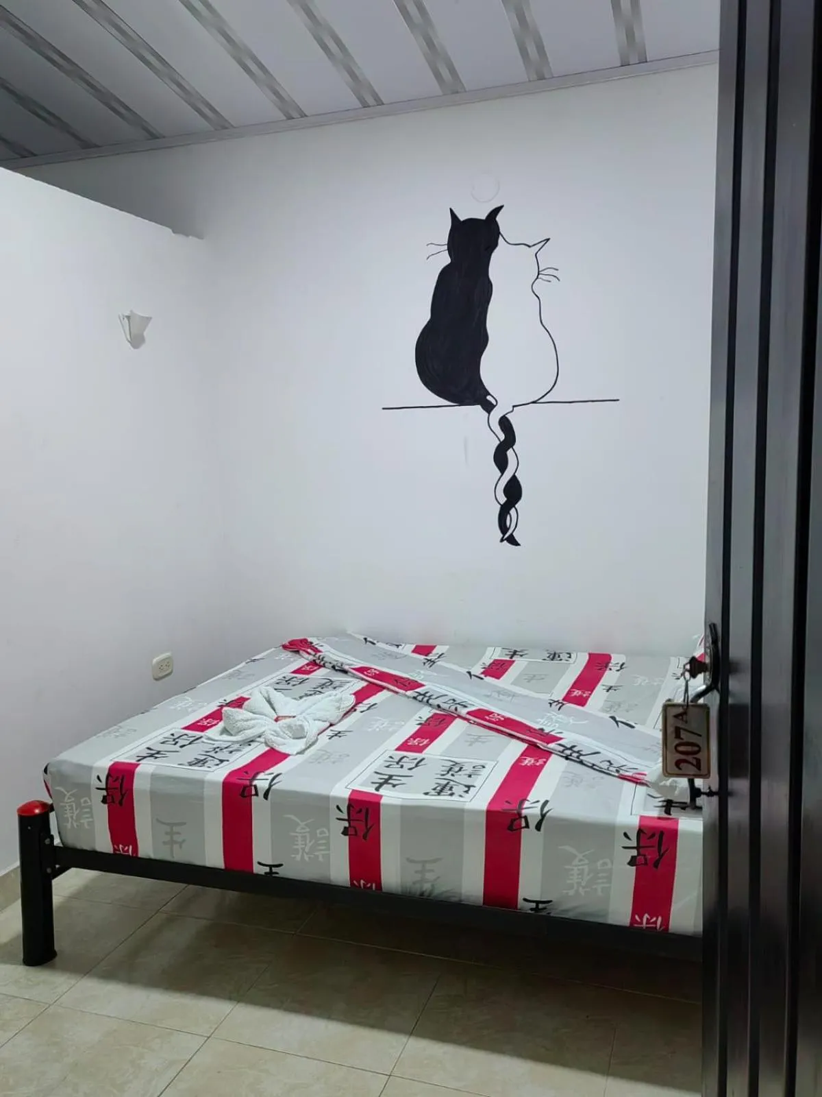 Bed in Hotel Plaza Confort Inn