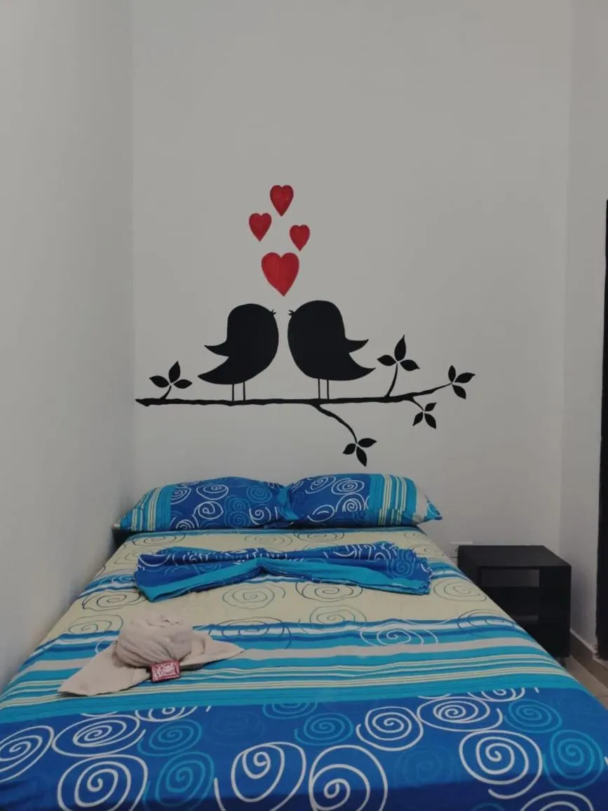 Bed in Hotel Plaza Confort Inn