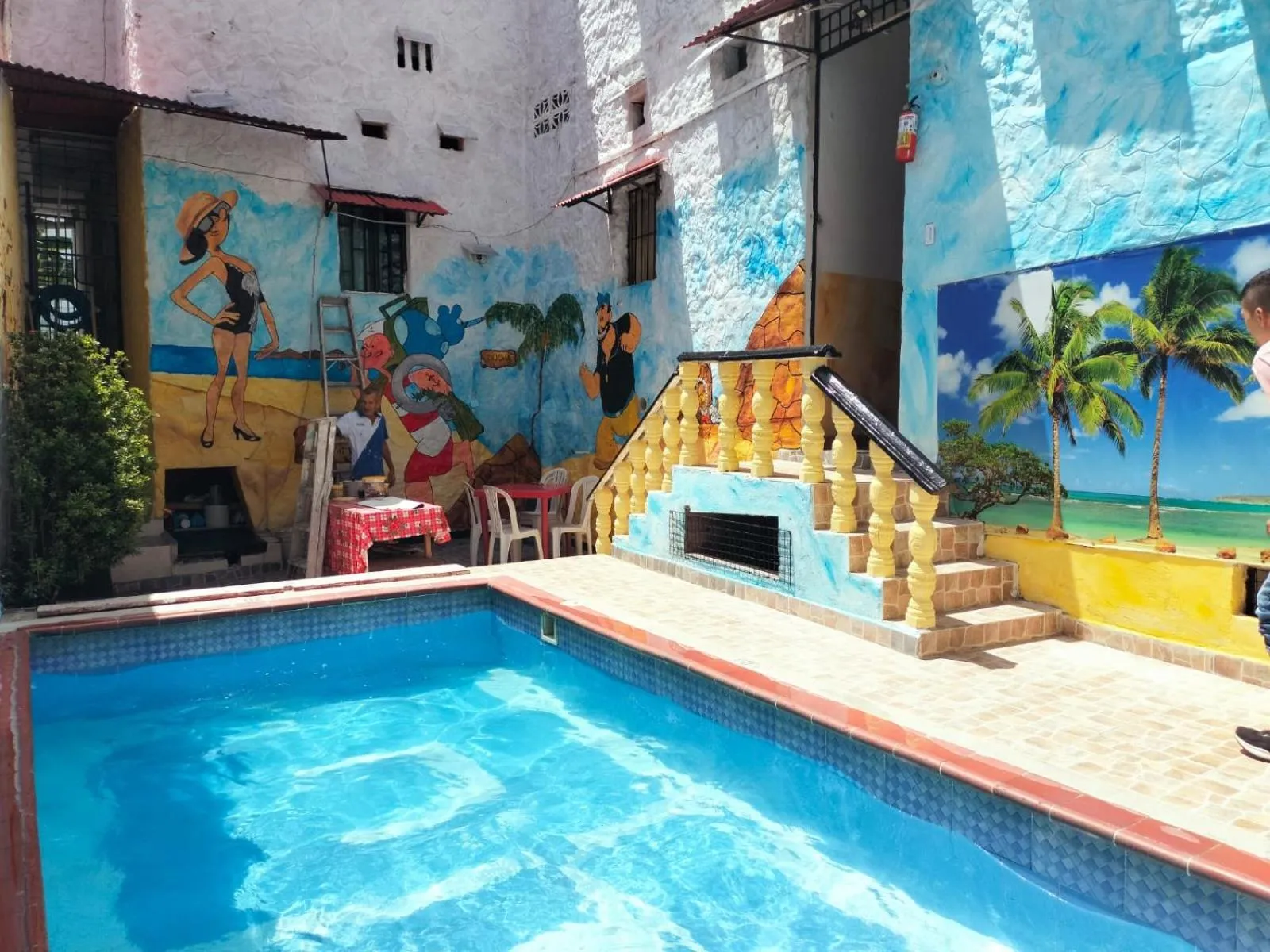 Swimming pool in Hotel Plaza Confort Inn