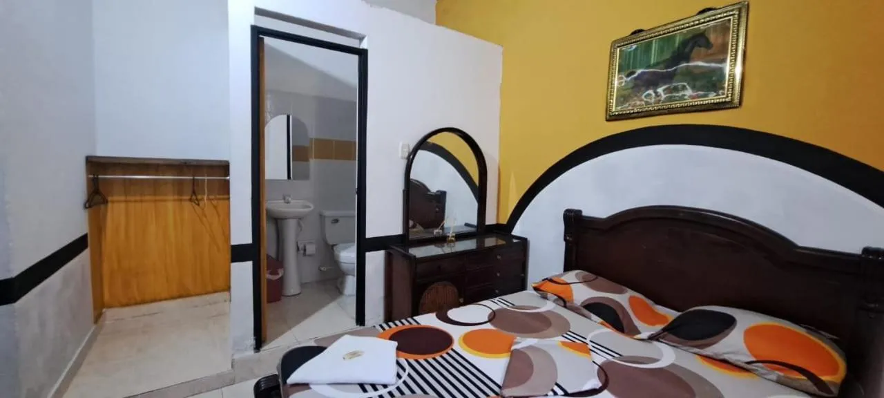 Bed in Hotel Plaza Confort Inn