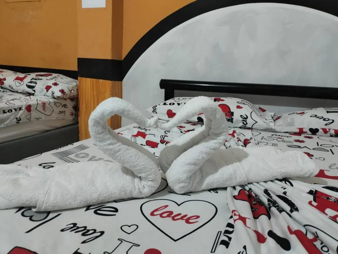 Bed in Hotel Plaza Confort Inn