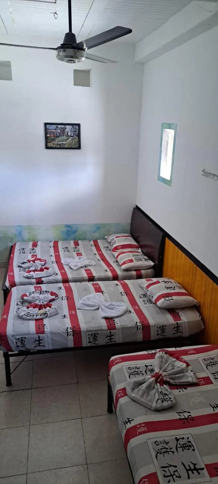 Bed in Hotel Plaza Confort Inn