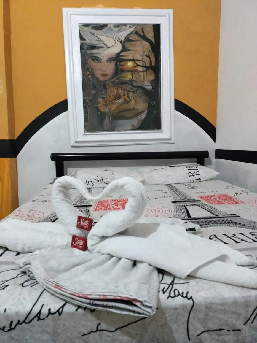 Bed in Hotel Plaza Confort Inn