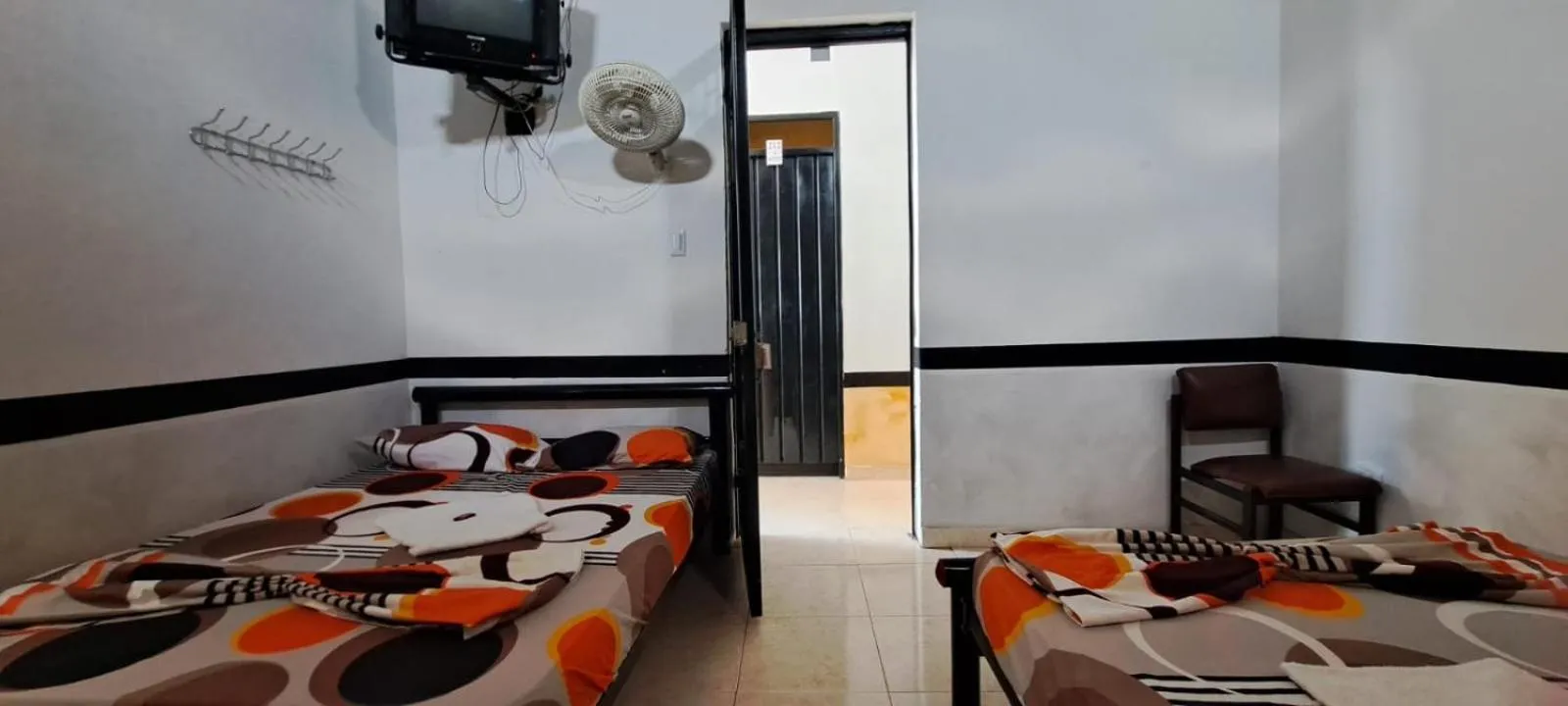 Bed in Hotel Plaza Confort Inn