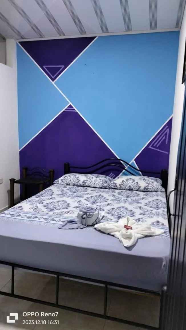 Bed in Hotel Plaza Confort Inn