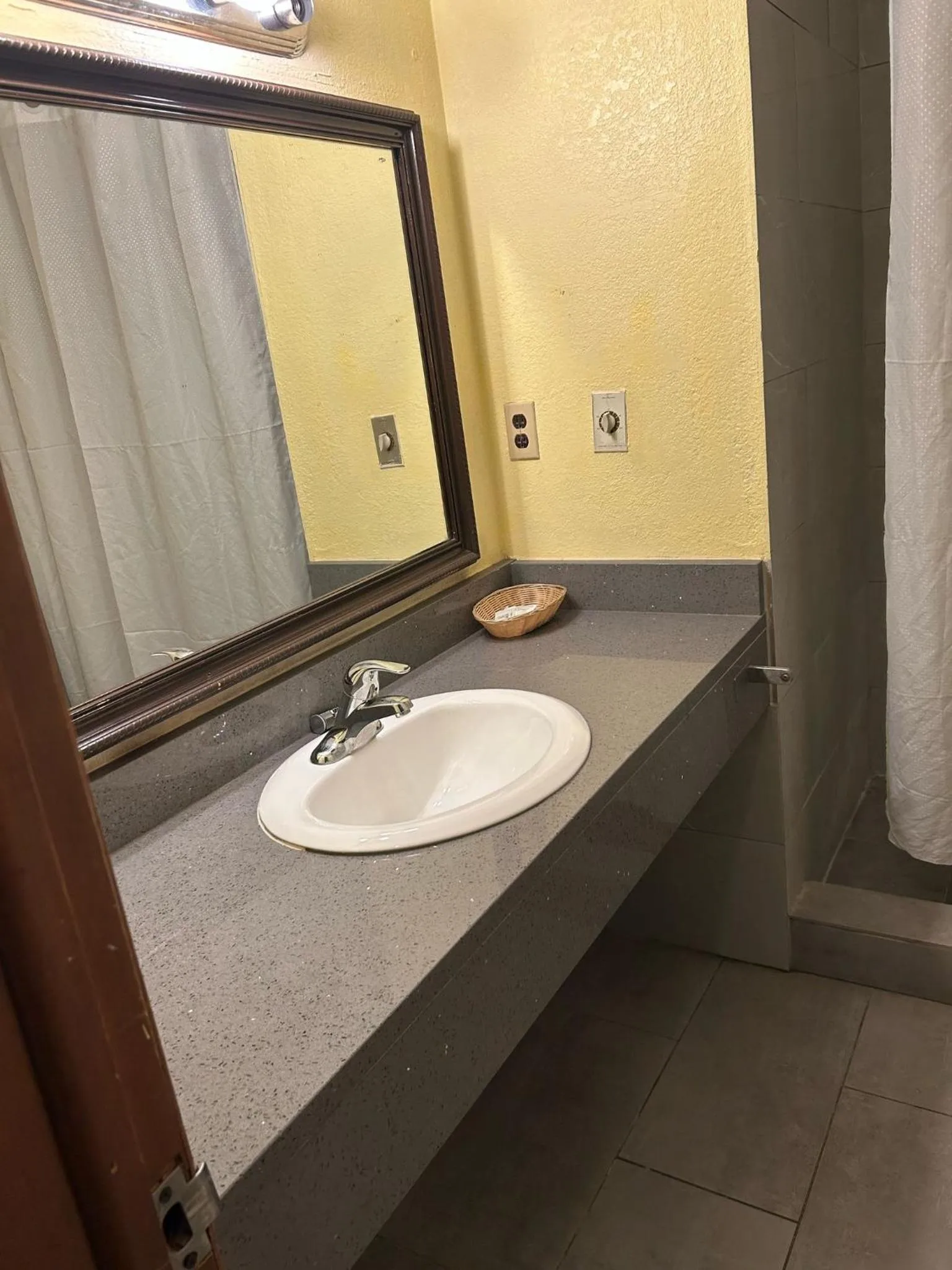 Bathroom in Hillcrest Motel by Oyo Aurora near Lawrenceburg