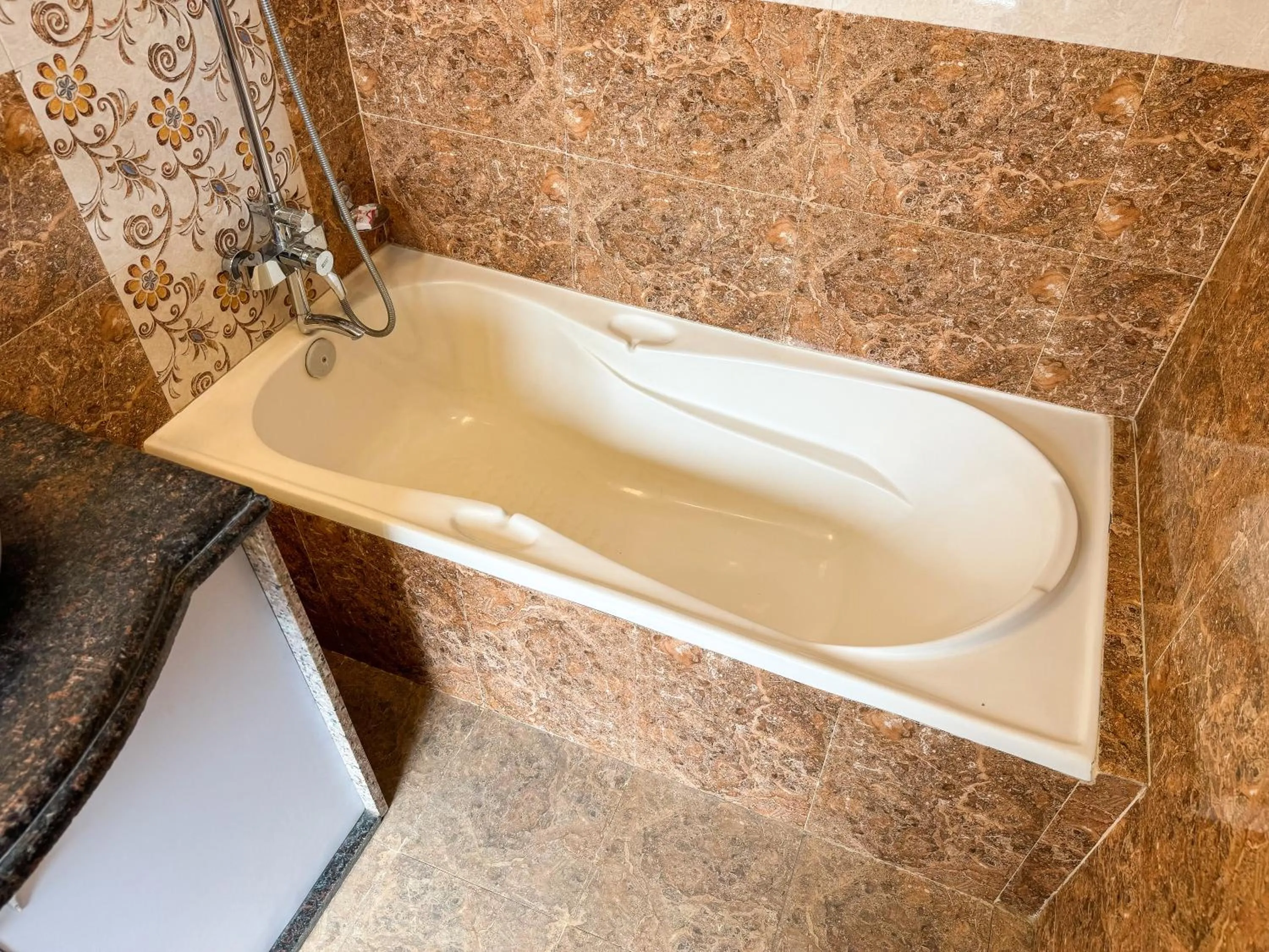 Bathroom in Hotel Abi International