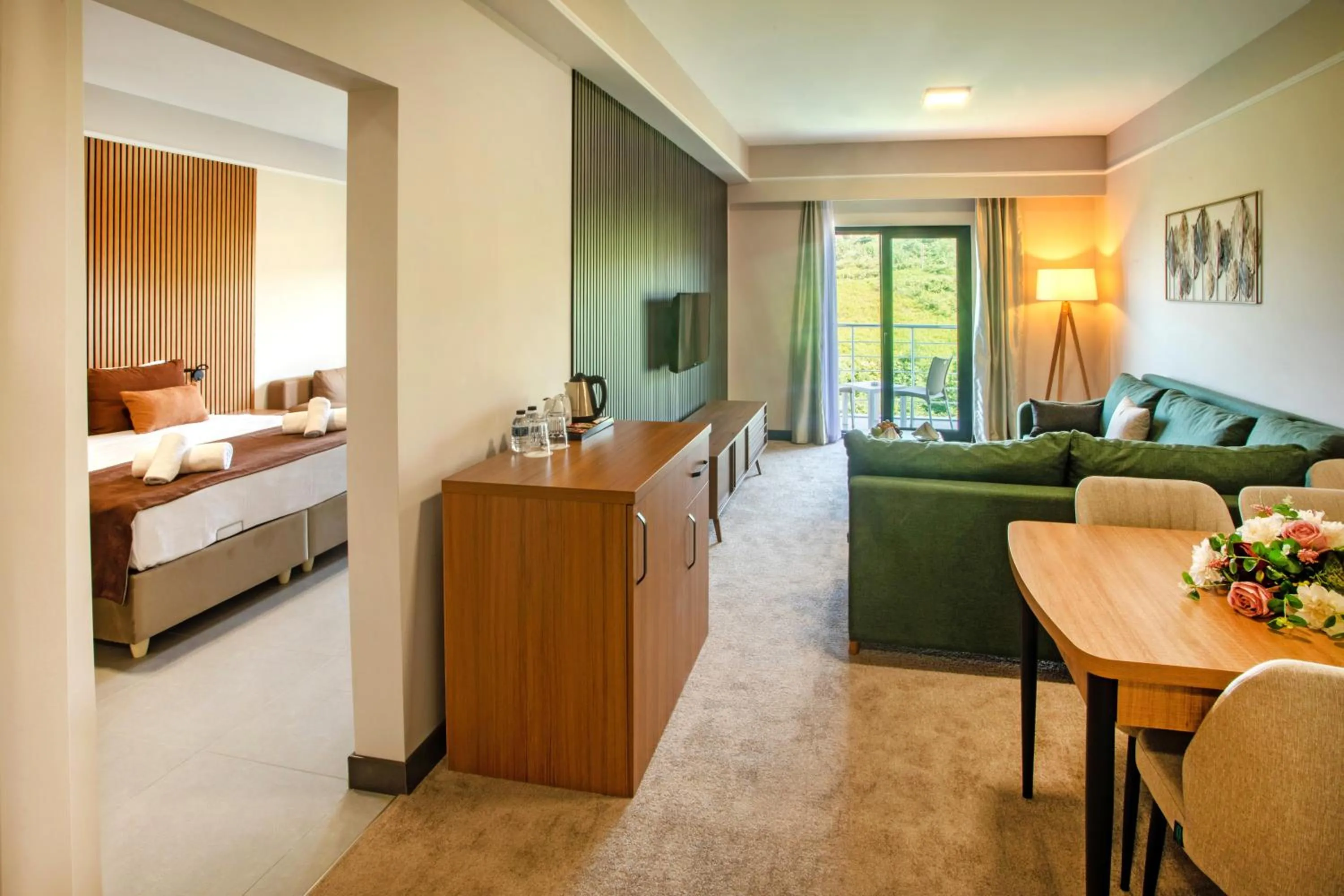 Seating area, Bed in First Joy Hotel