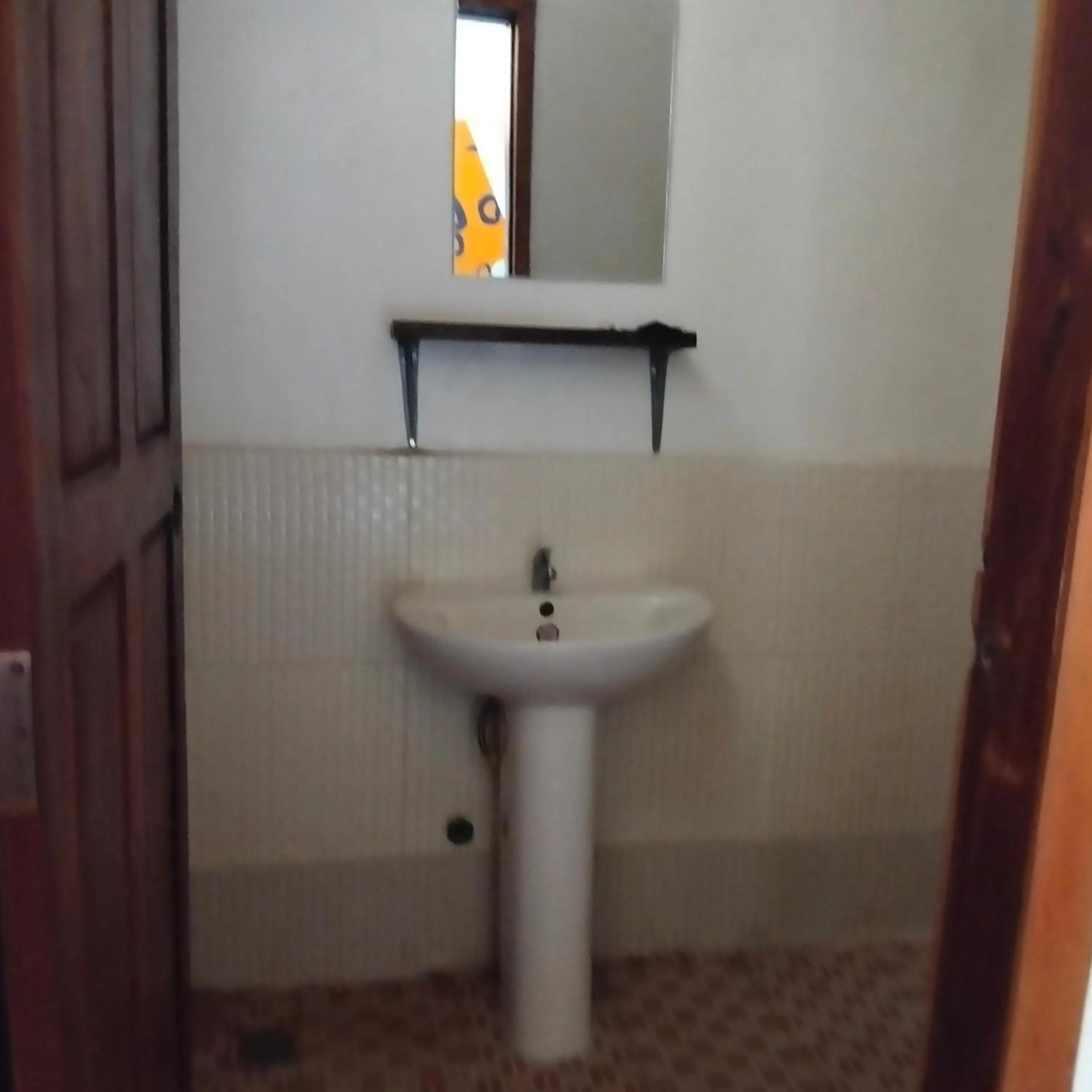 Toilet in Nomad Guesthouse