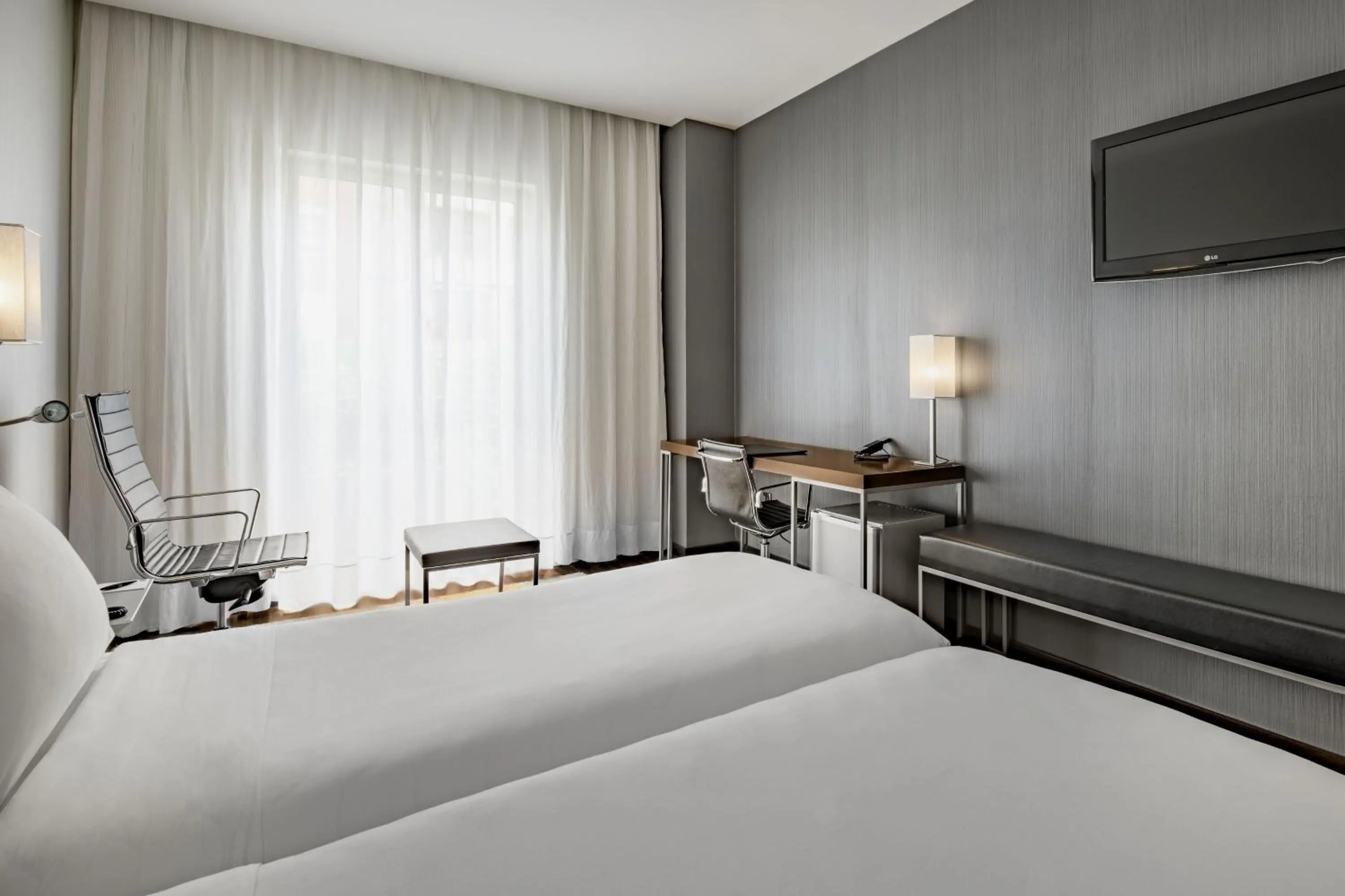 Photo of the whole room, Bed in AC Hotel Burgos by Marriott