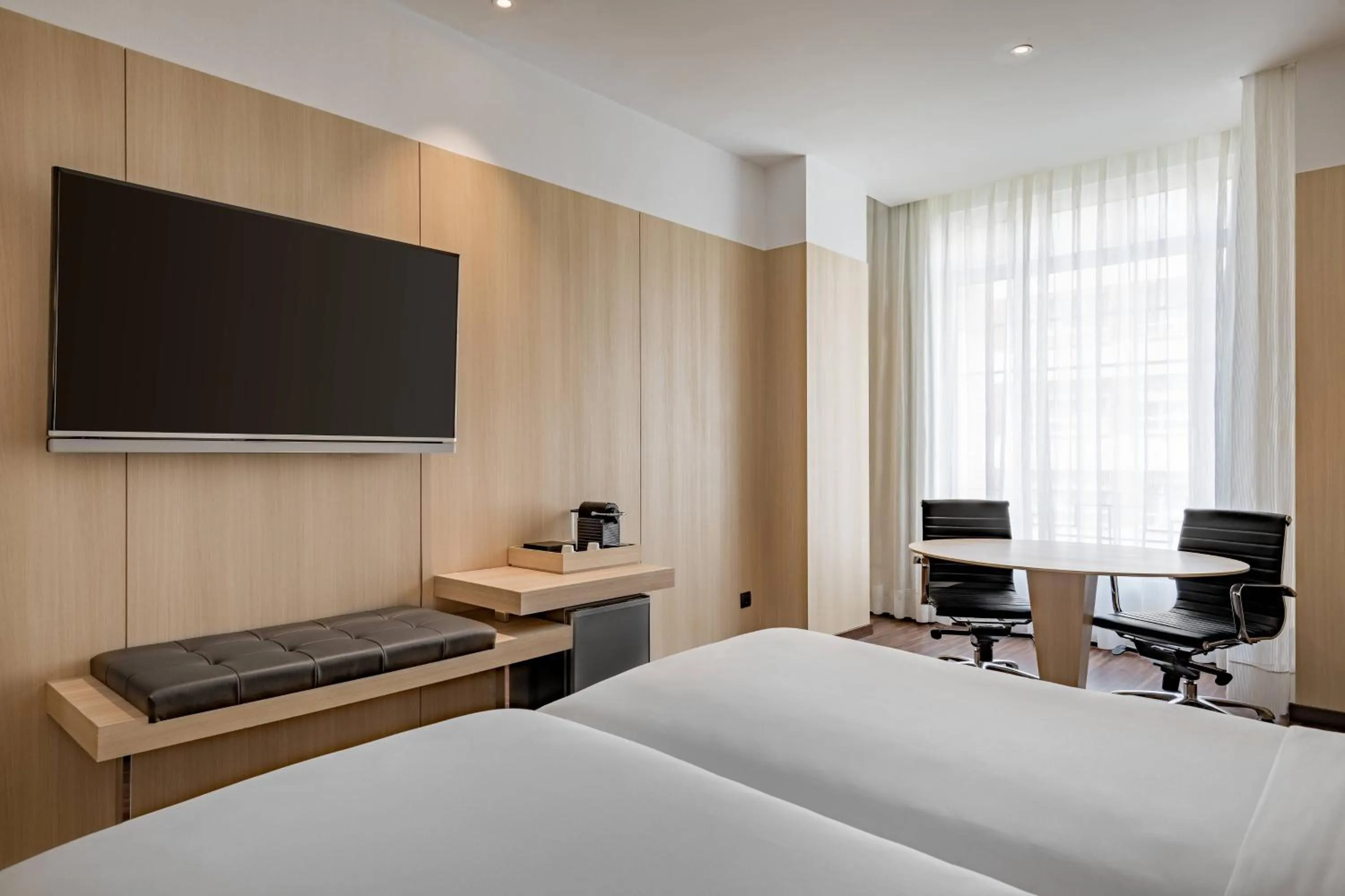 Photo of the whole room, Bed in AC Hotel Burgos by Marriott