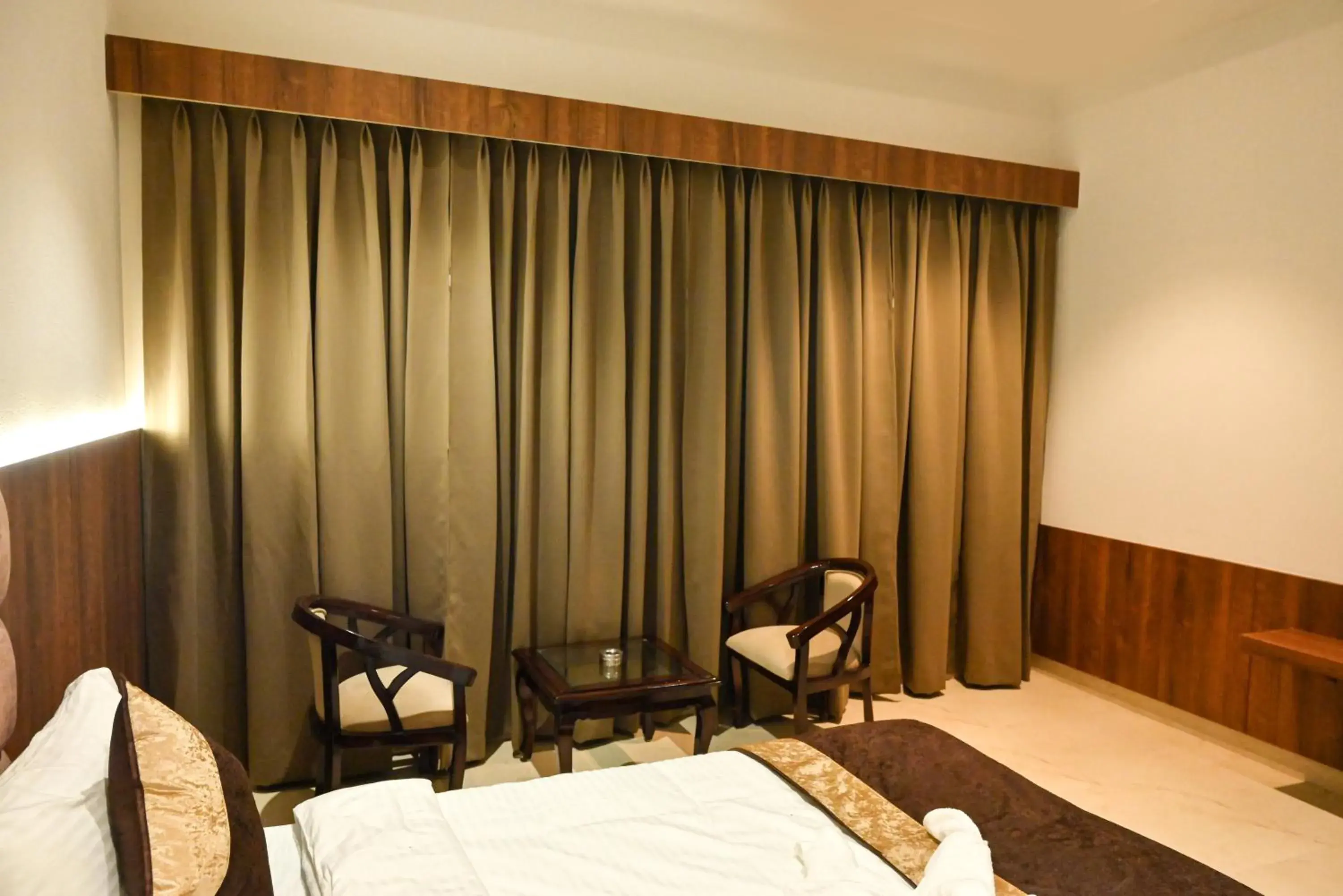 Living room, Bed in MD FARMS AND RESORTS Living room, Bed in MD FARMS AND RESORTS