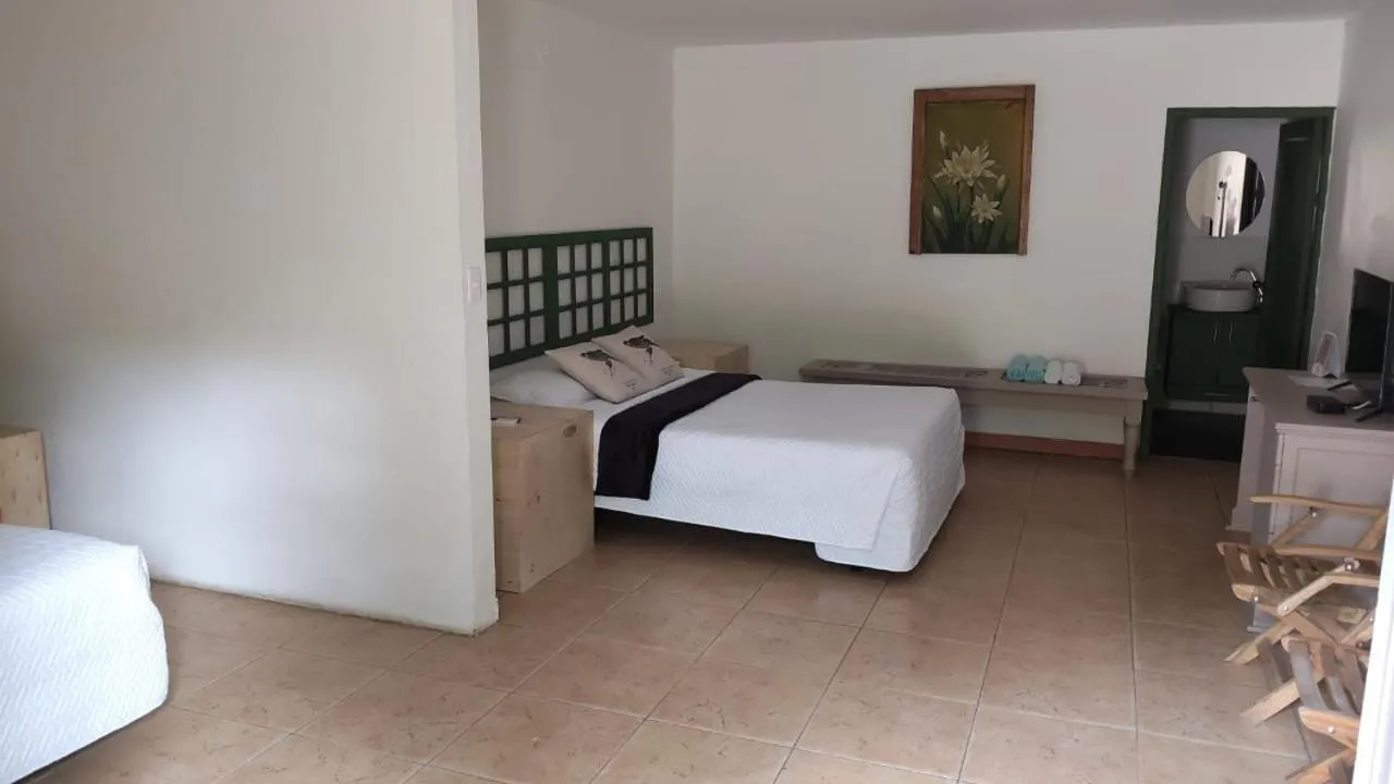 Bed in Finca Hotel Guadalupe