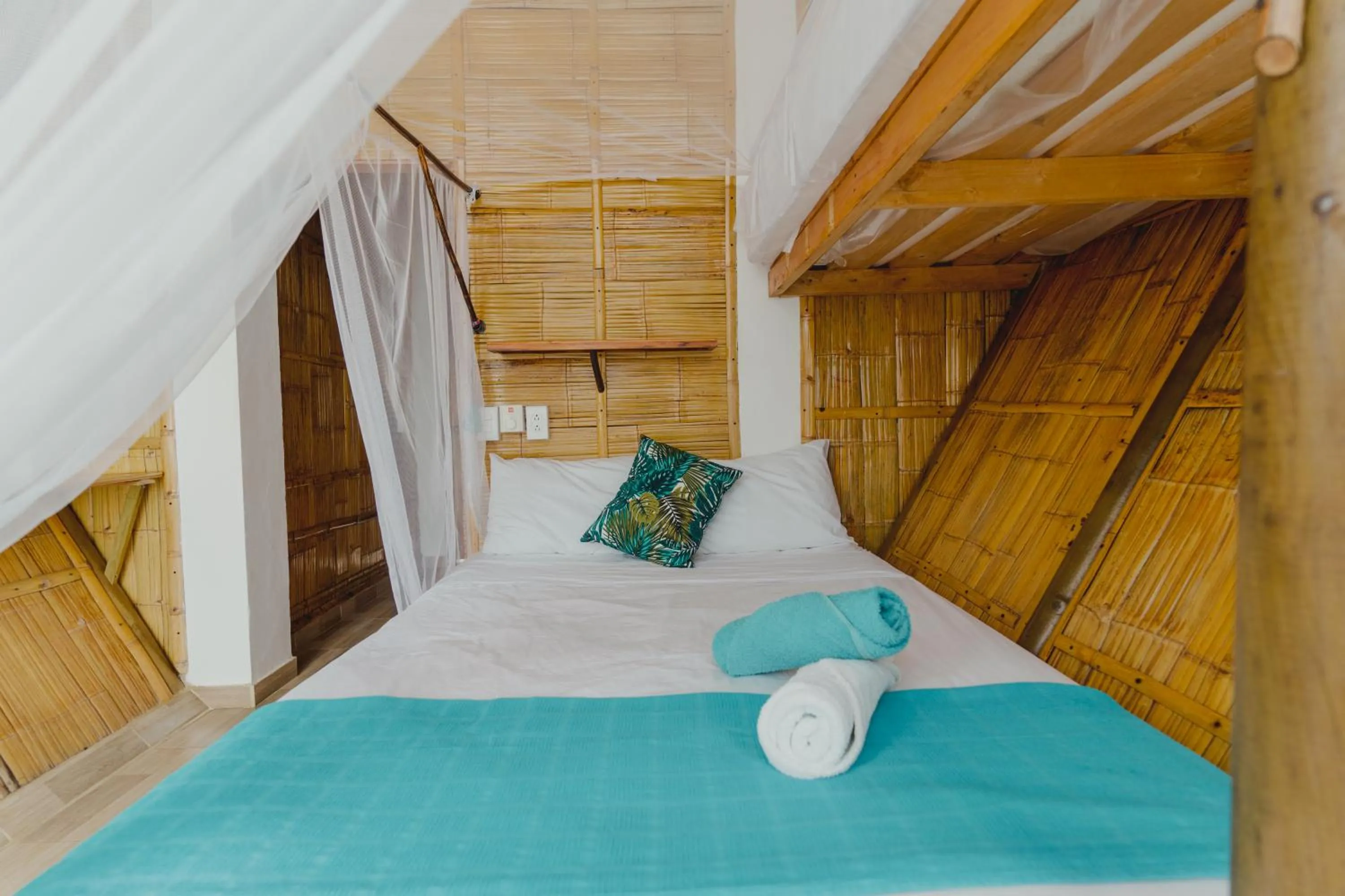 Bed in UUTTAAKA Eco-Hotel