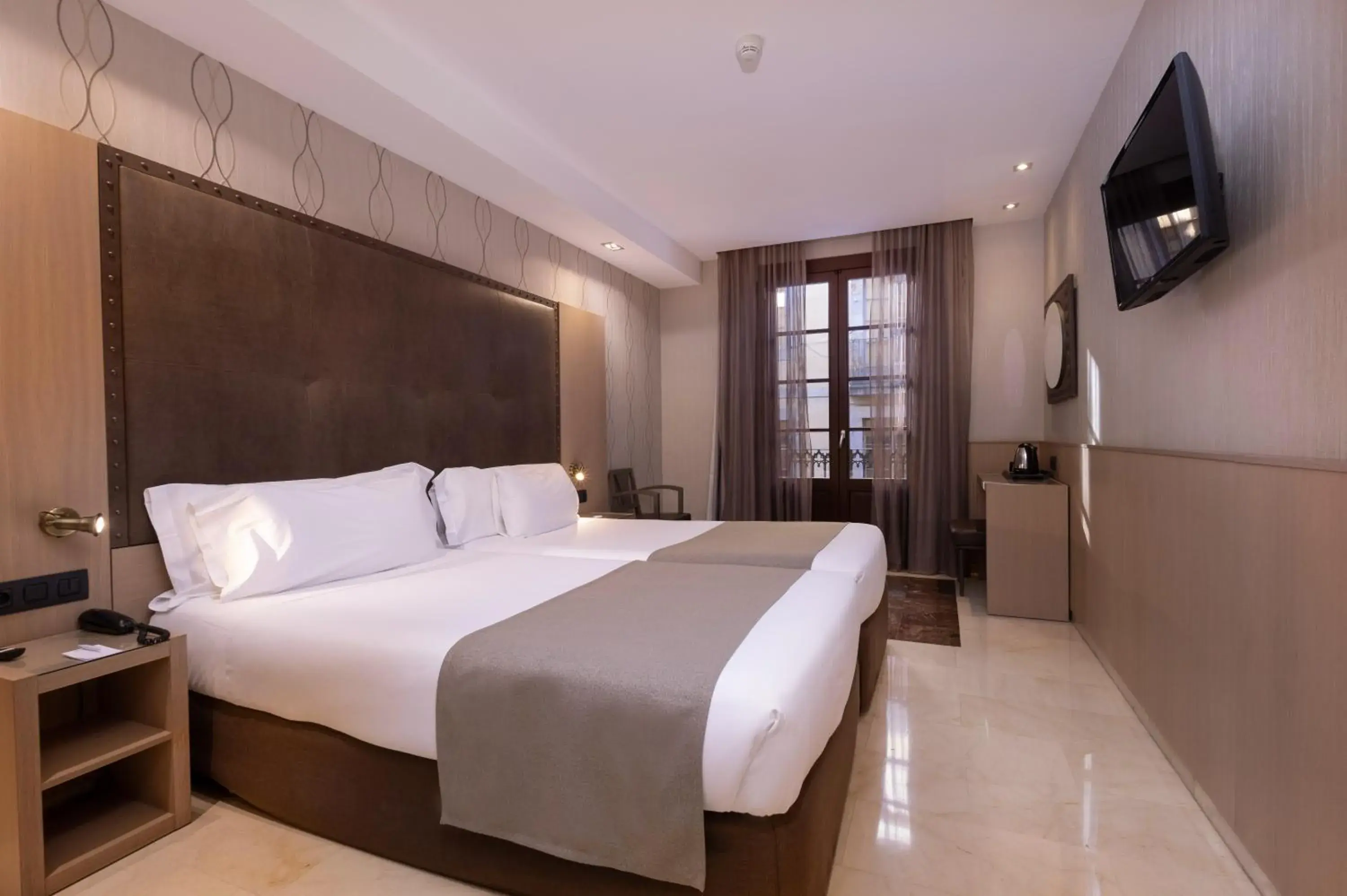 Bedroom, Bed in Gran Hotel Barcino Bedroom, Bed in Gran Hotel Barcino