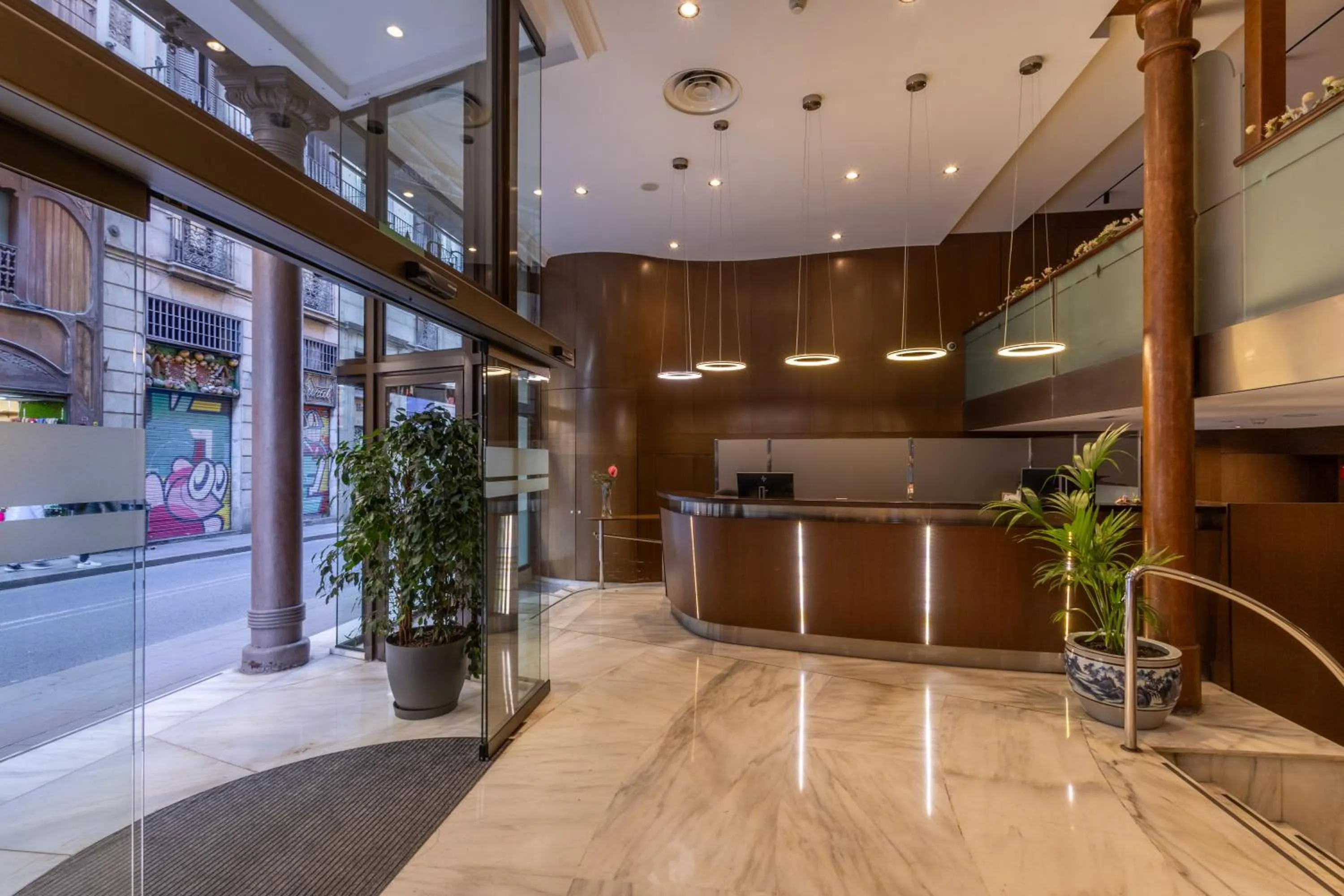 Lobby or reception in Gran Hotel Barcino