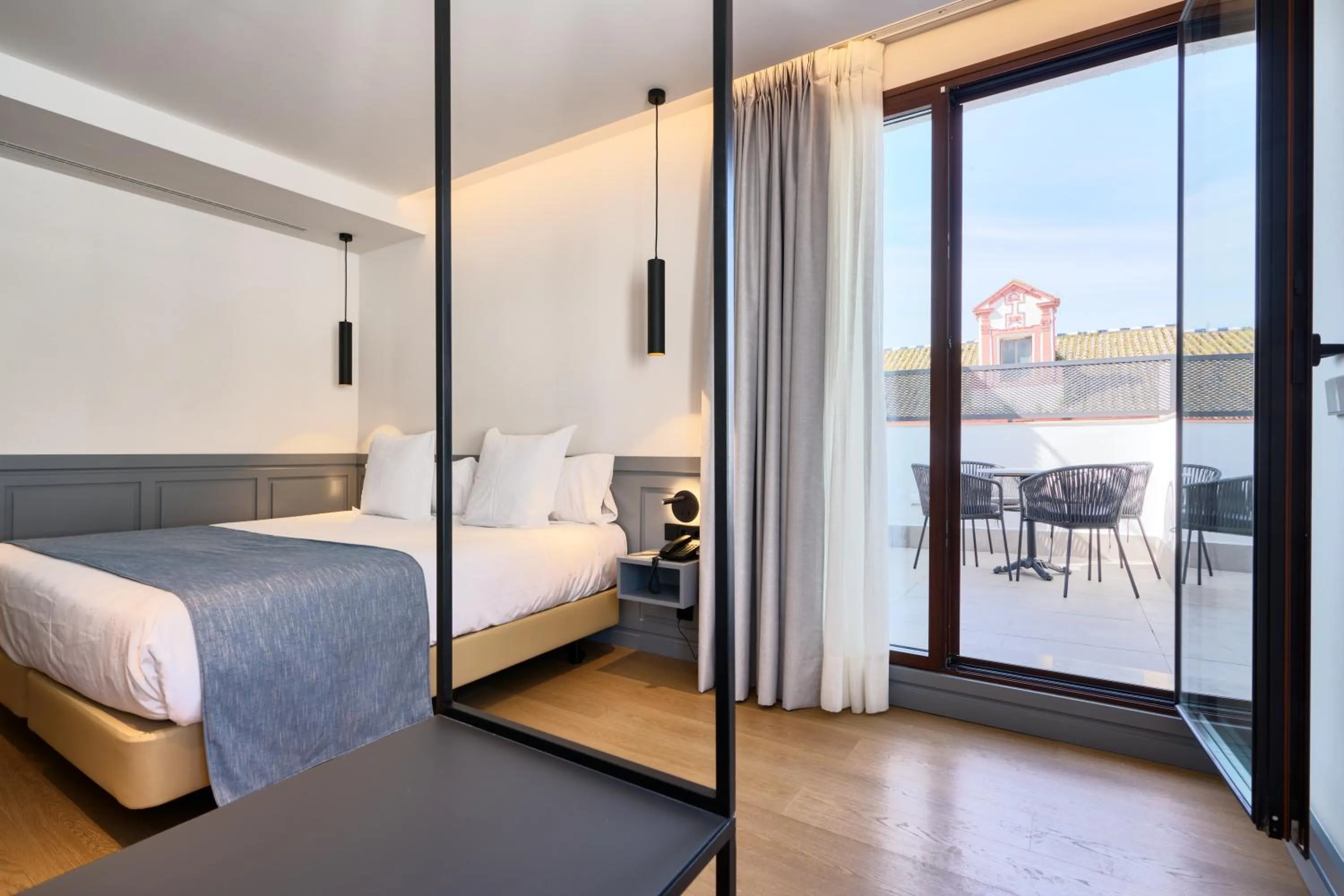 Bed in Hotel Murillo Reinoso