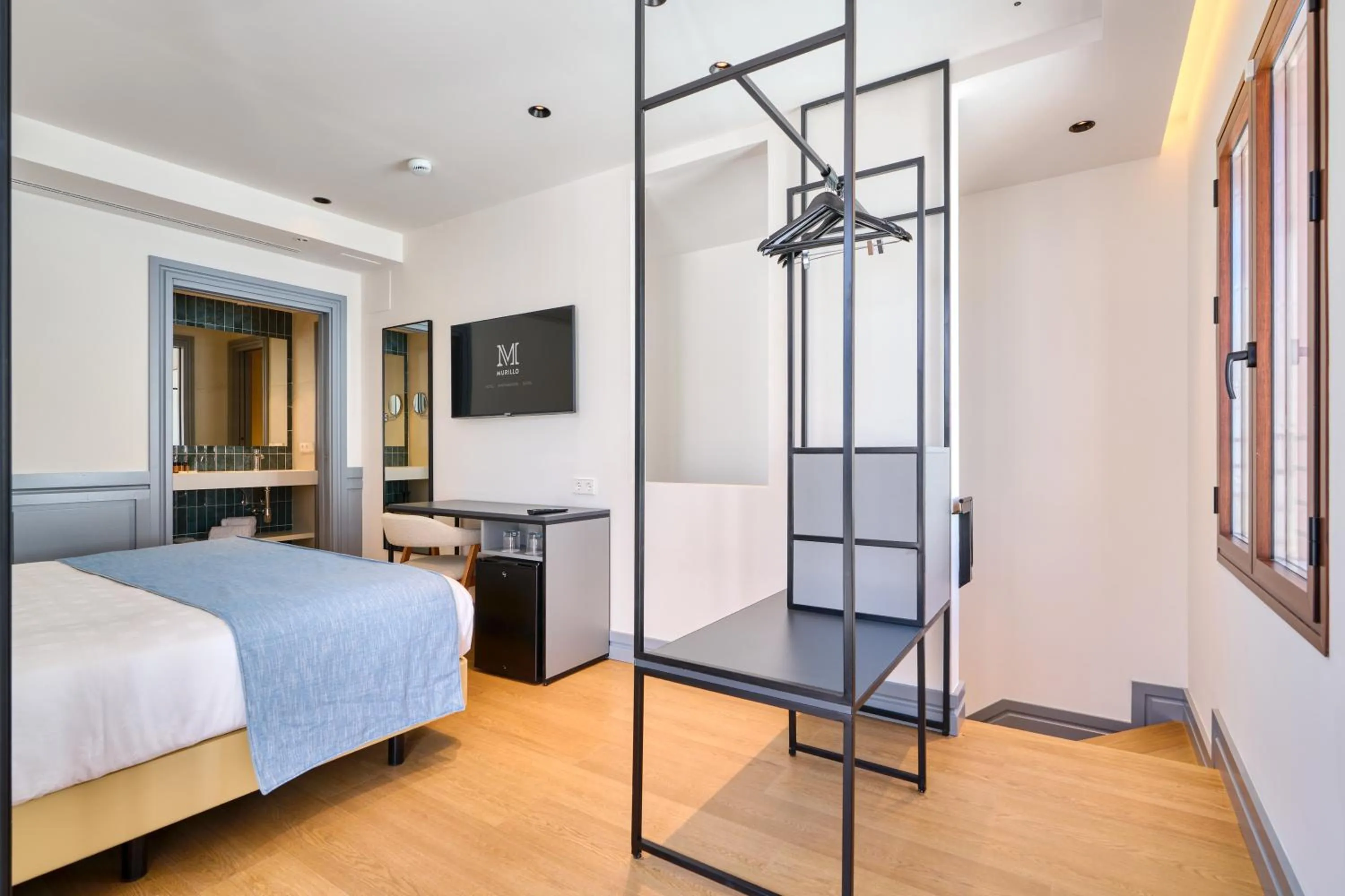 Bed in Hotel Murillo Reinoso